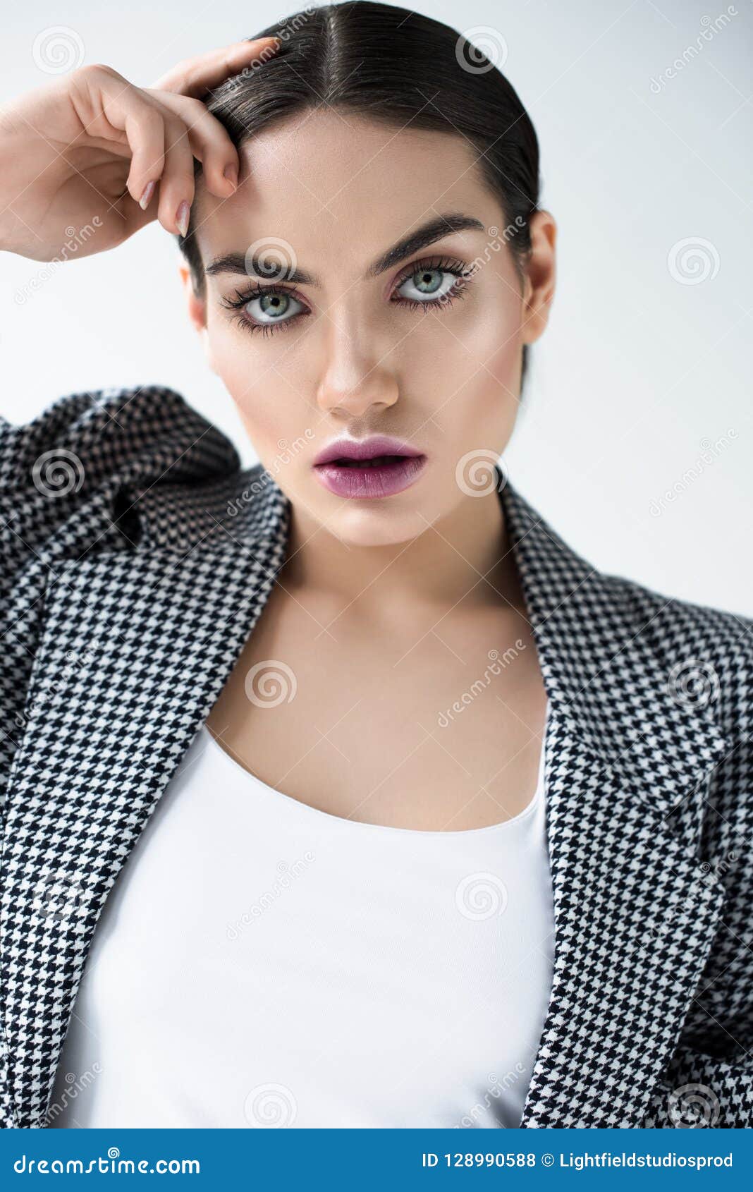 Attractive Girl with Makeup Posing in Vintage Jacket Stock Photo