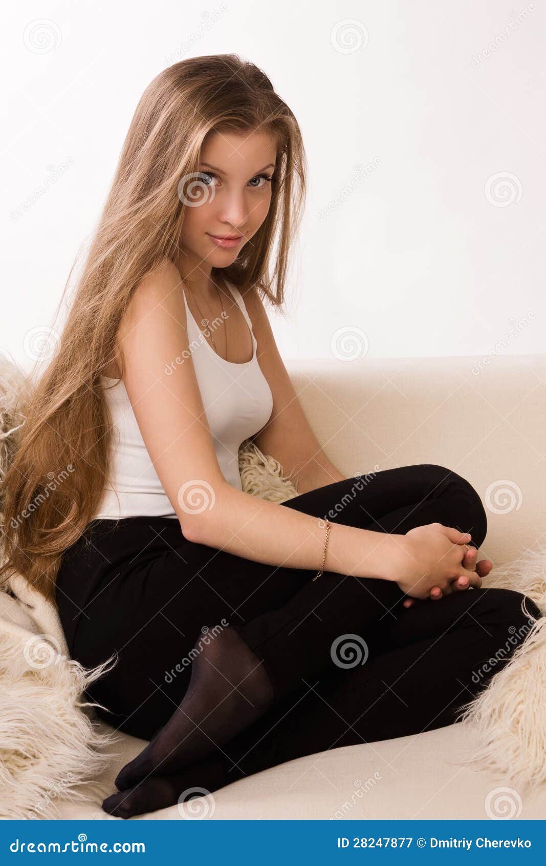 Attractive Girl Sitting On A Sofa Stock Image - Image of ...