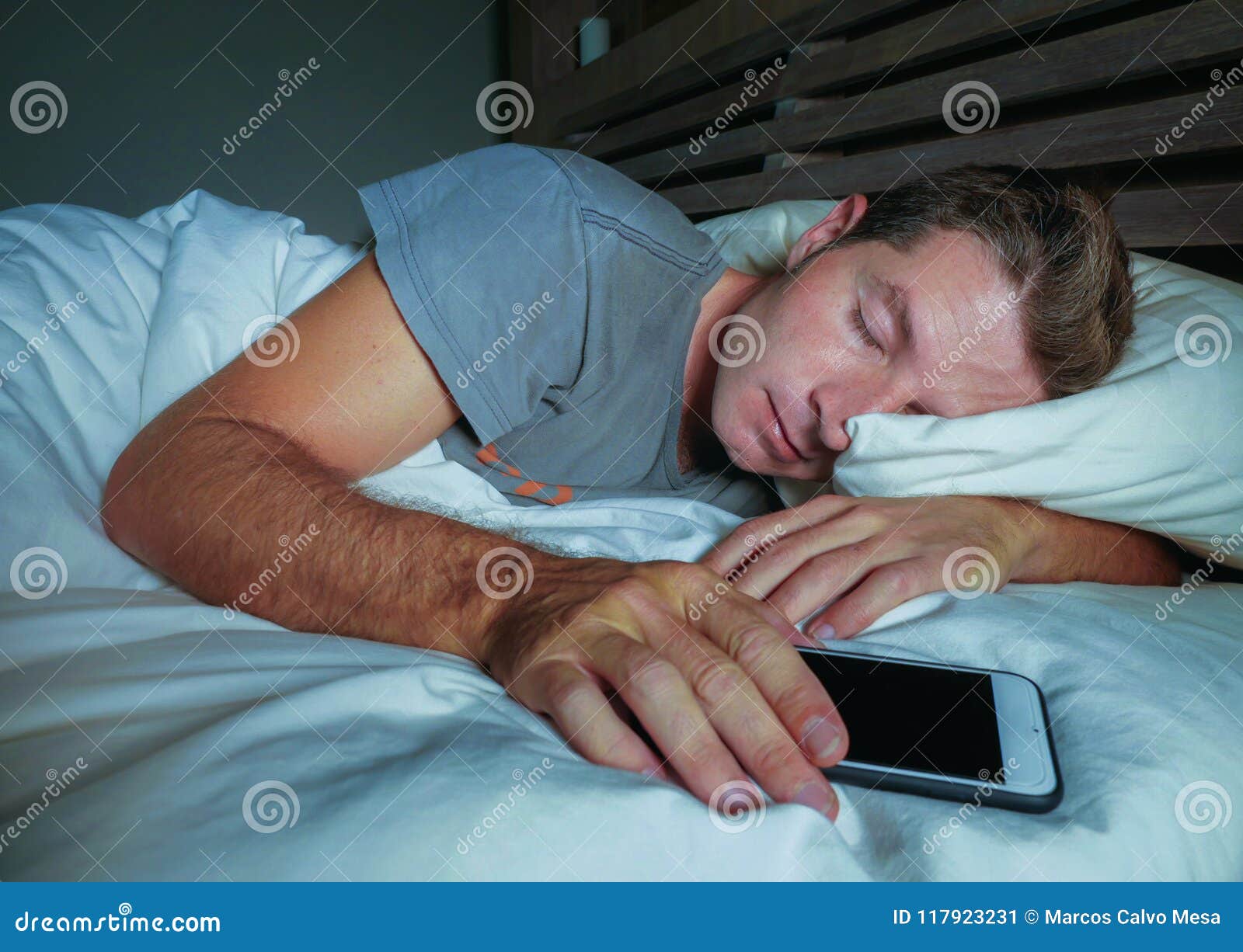 Attractive And Handsome Tired Man On His 30s Or 40s In Bed Sleeping