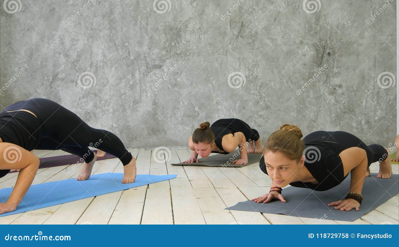 Attractive Happy Young Women Working Out Indoors, Standing in Upward ...