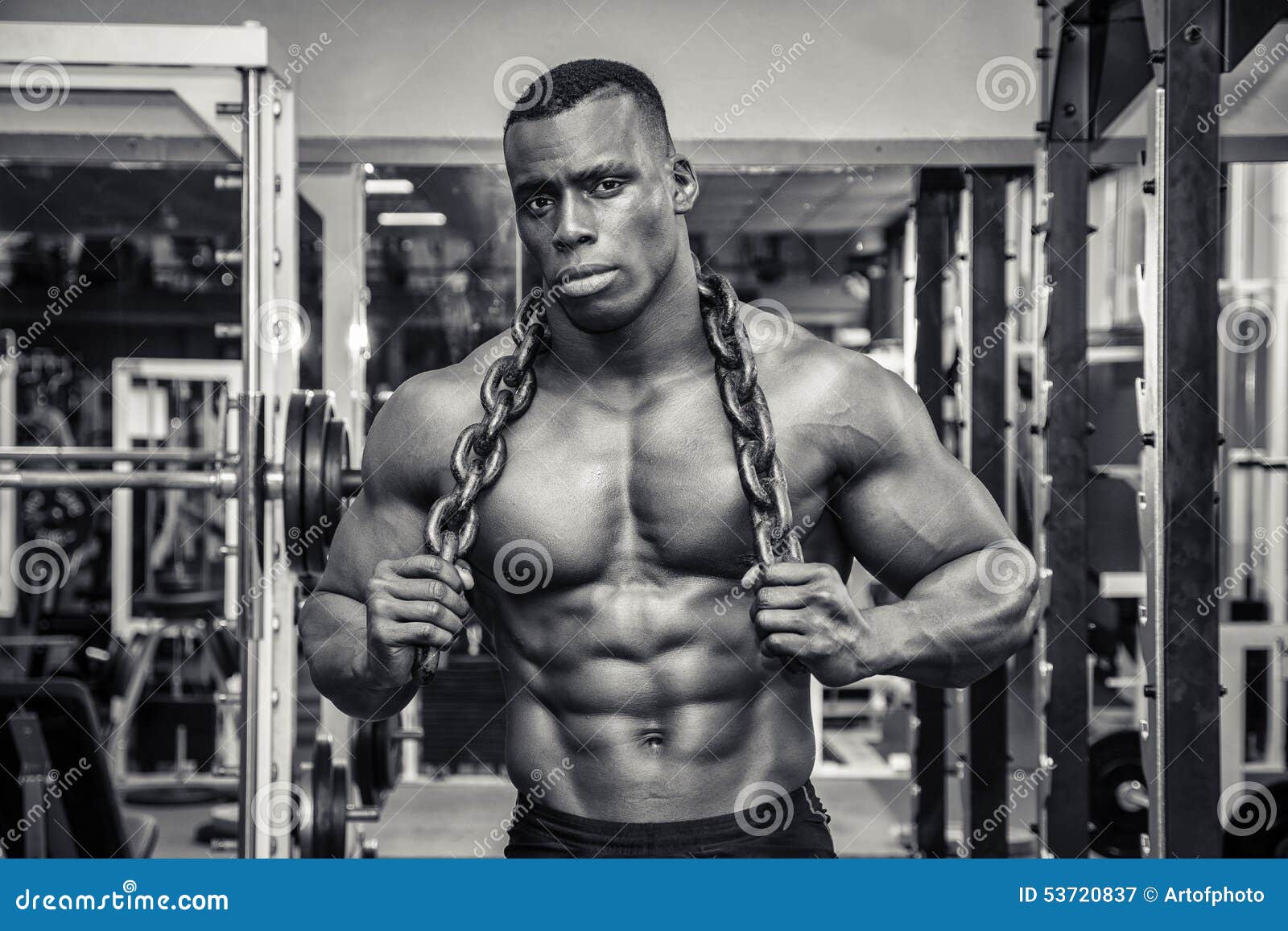 Sportsman athlete bodybuilder posing in the gym Stock Photo - Alamy