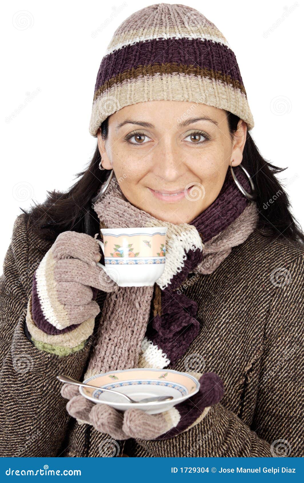 Attractive Lady Sheltered for the Winter Drinking a Tea Cup Stock Photo ...