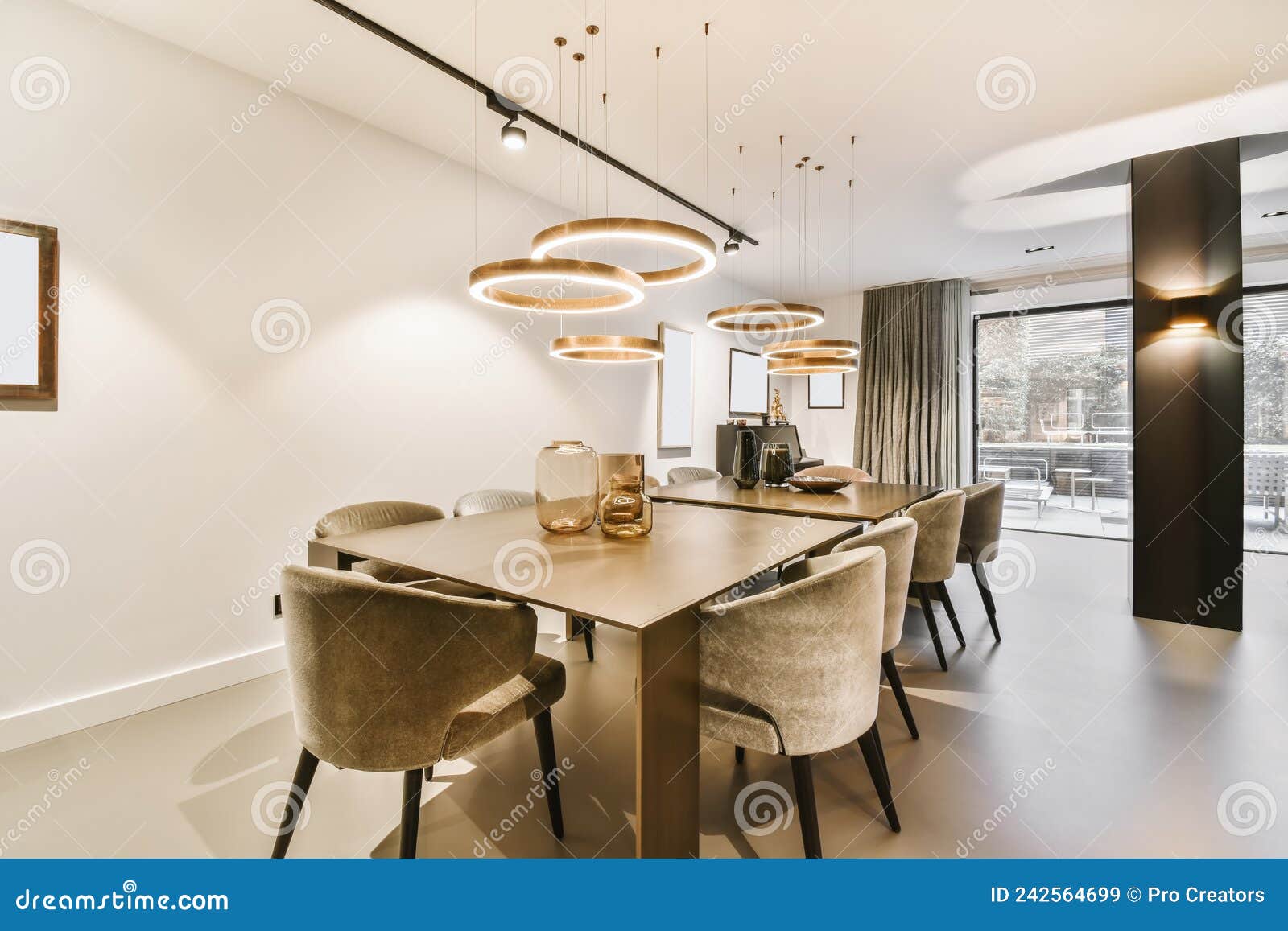 An Attractive Large Dining Room with a Black Table Stock Image Image