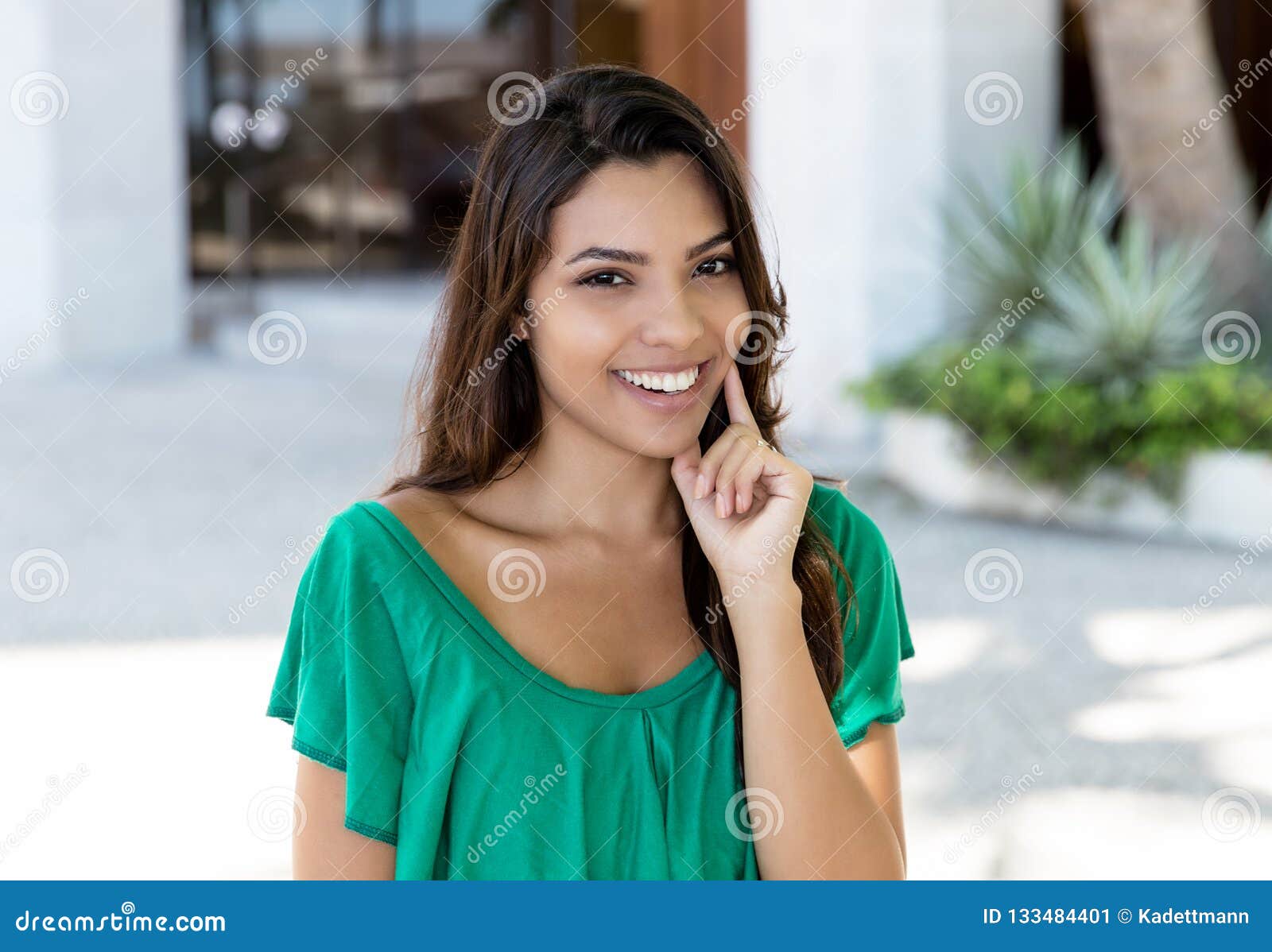 https://thumbs.dreamstime.com/z/attractive-latin-american-young-adult-woman-green-shirt-attractive-latin-american-young-adult-woman-green-shirt-summer-133484401.jpg