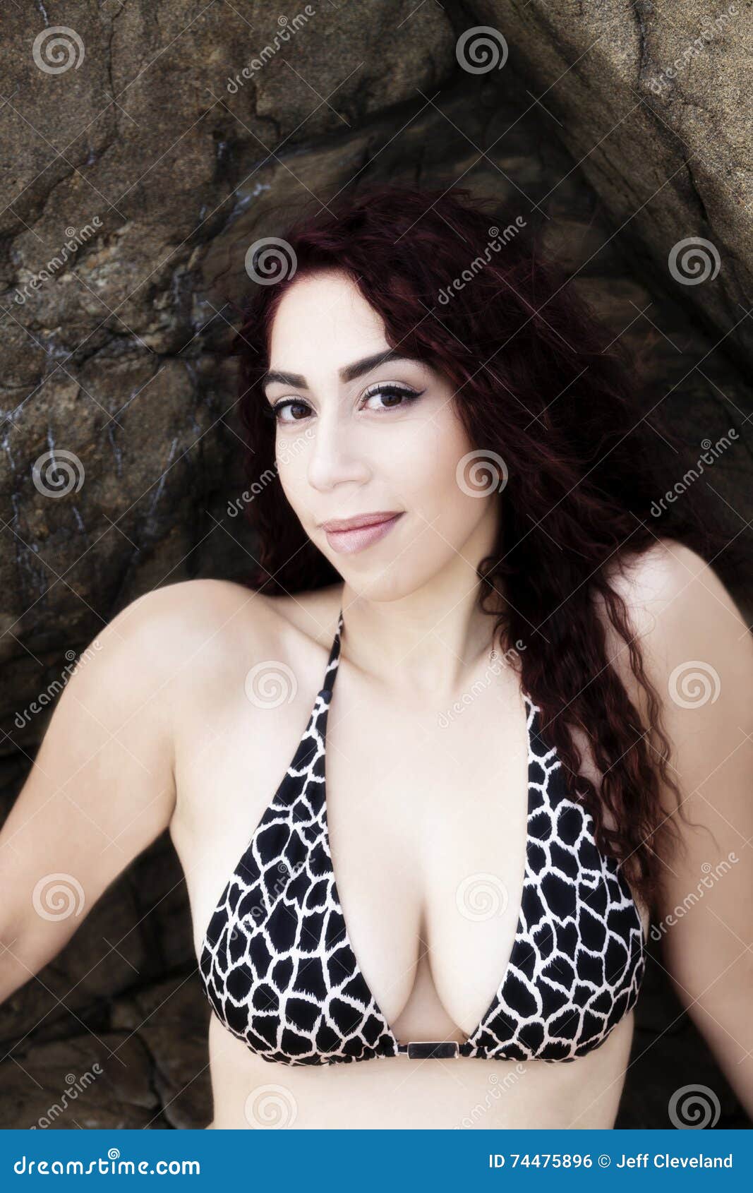 Attractive Latina Woman Bikini Top Sitting among Rocks Outdoors Stock Photo  image pic