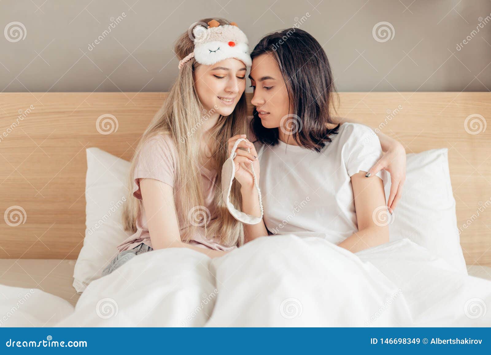 lesbian touches sleeping girl