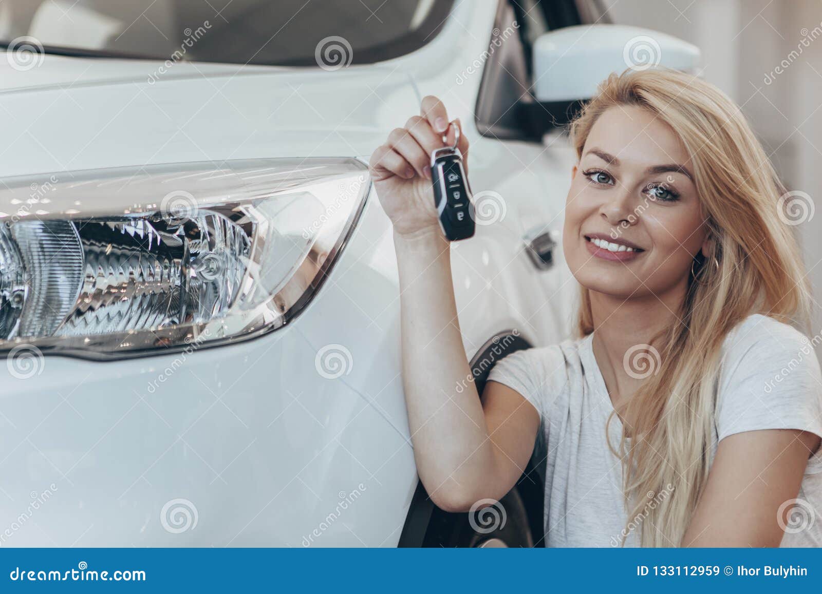 Beautiful Young Woman Buying New Car at the Dealership Stock Image ...