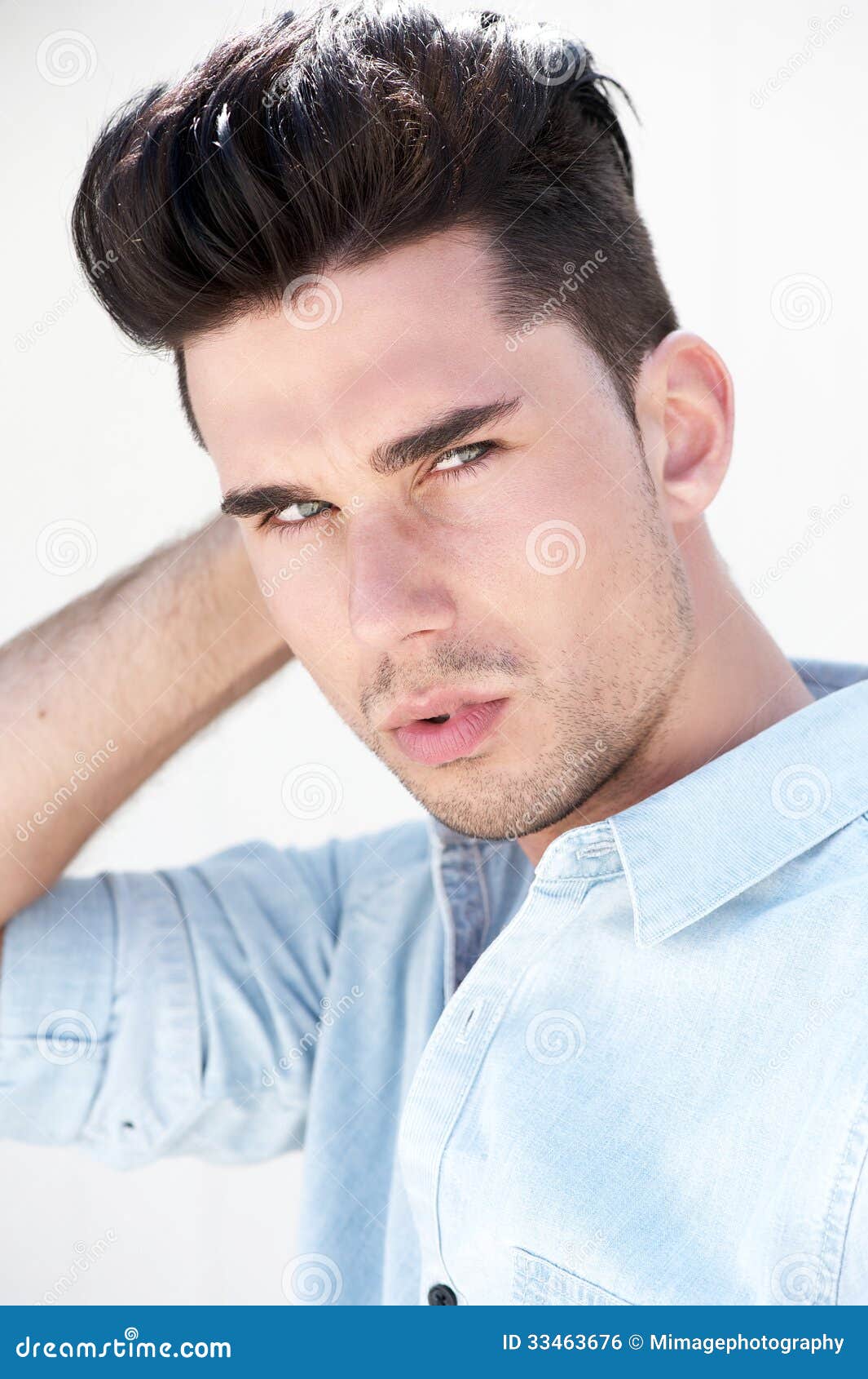Attractive Male Fashion Model With Hand In Hair Stock 