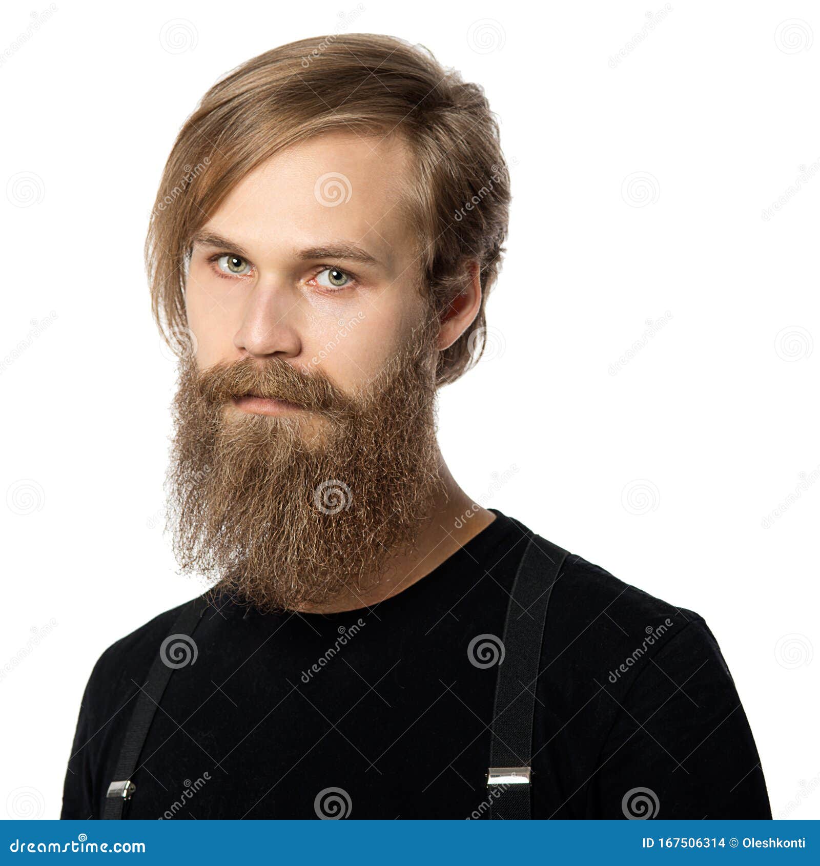 The Attractive Man the Blonde with Long Hair of the European Appearance  with a Beard in a Black T-shirt and Black Trousers on a Stock Photo - Image  of background, attractive: 167506314