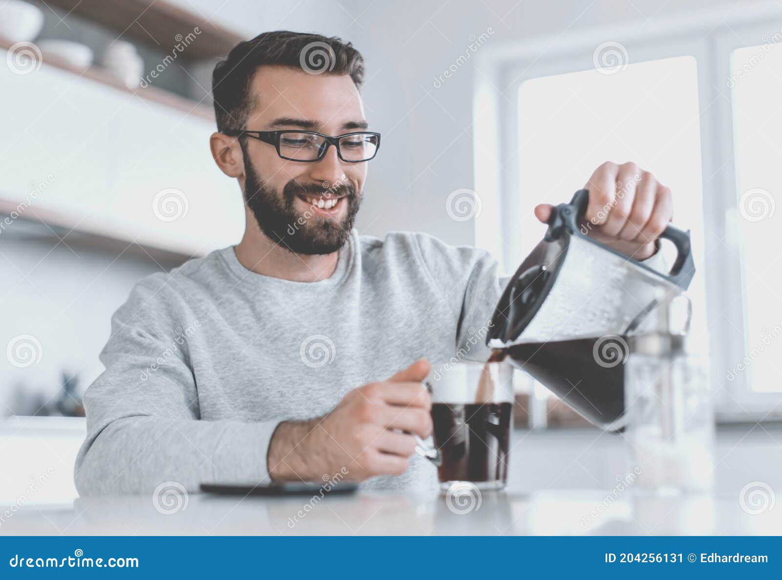 Attractive Man Pouring Himself a Cup of Morning Coffee Stock Image ...