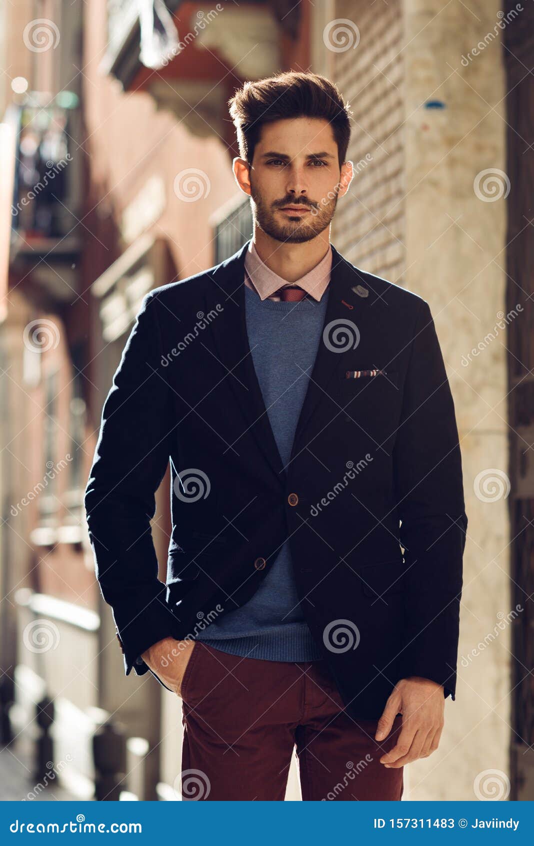 Attractive Man Wearing British Elegant Suit in the Street. Modern Hairstyle.  Stock Image - Image of streetstyle, stylish: 157311483