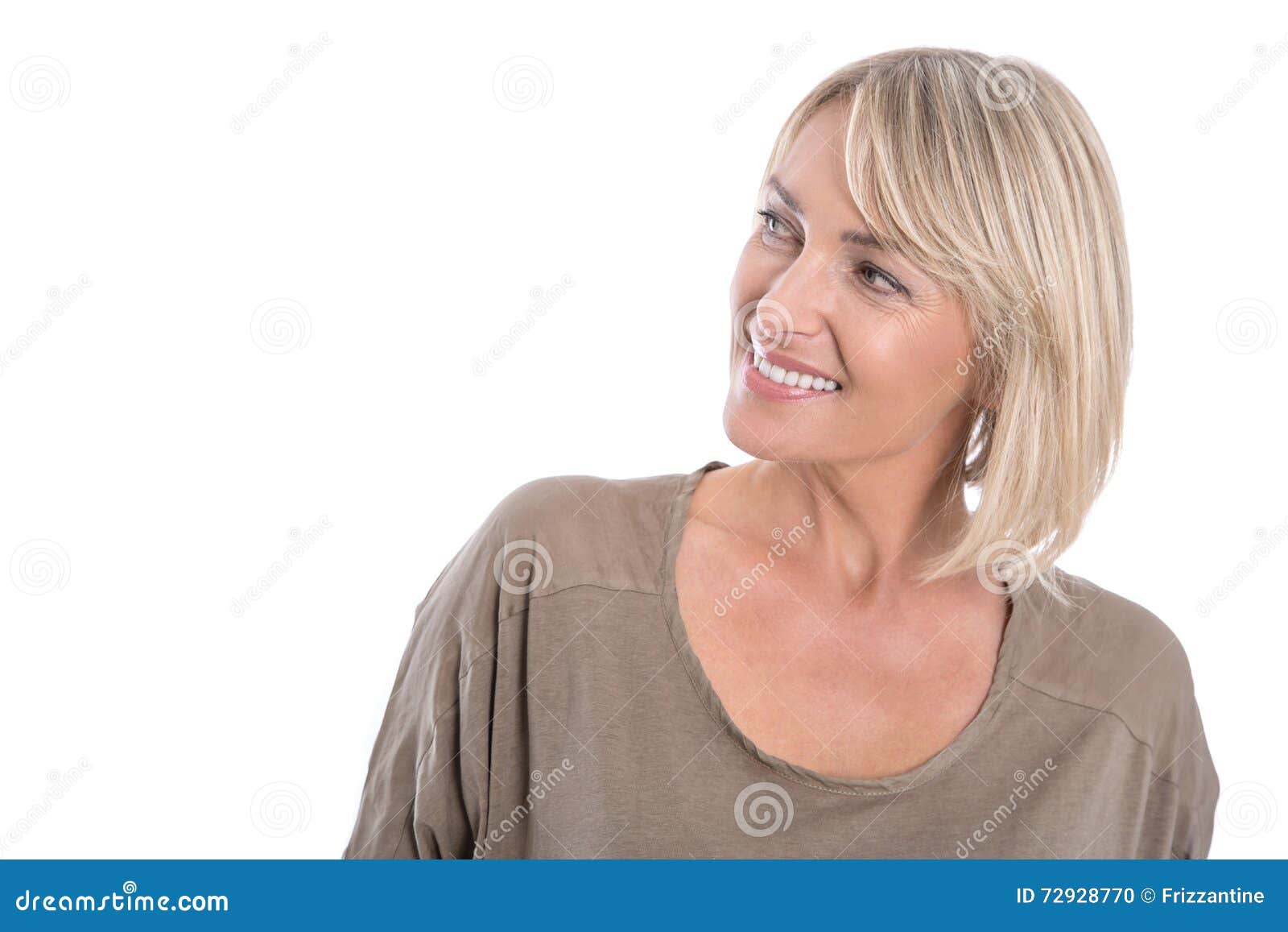 attractive middle aged blond woman looking sideways to text.