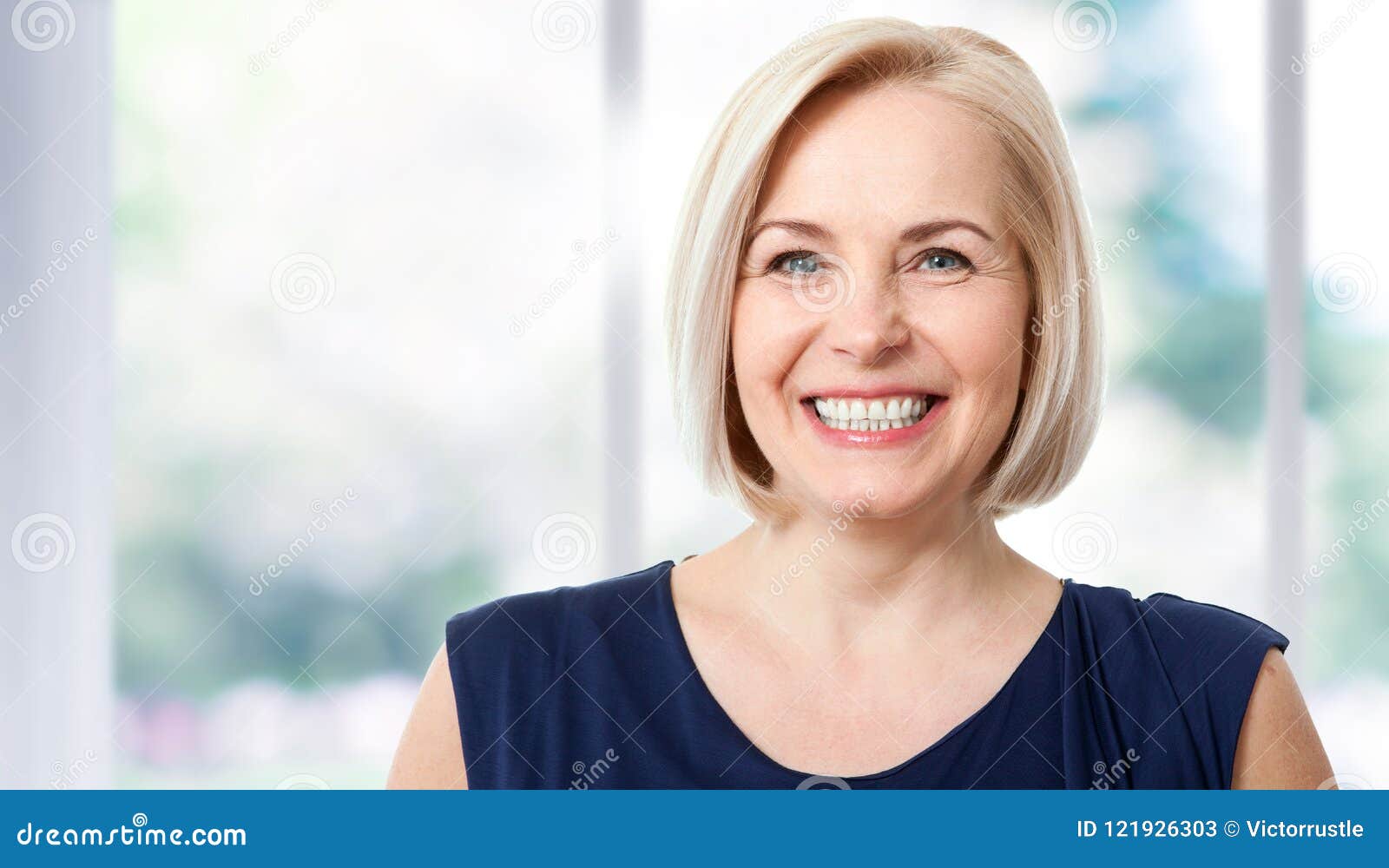 Attractive Middle Aged Woman with a Beautiful Smile Near the