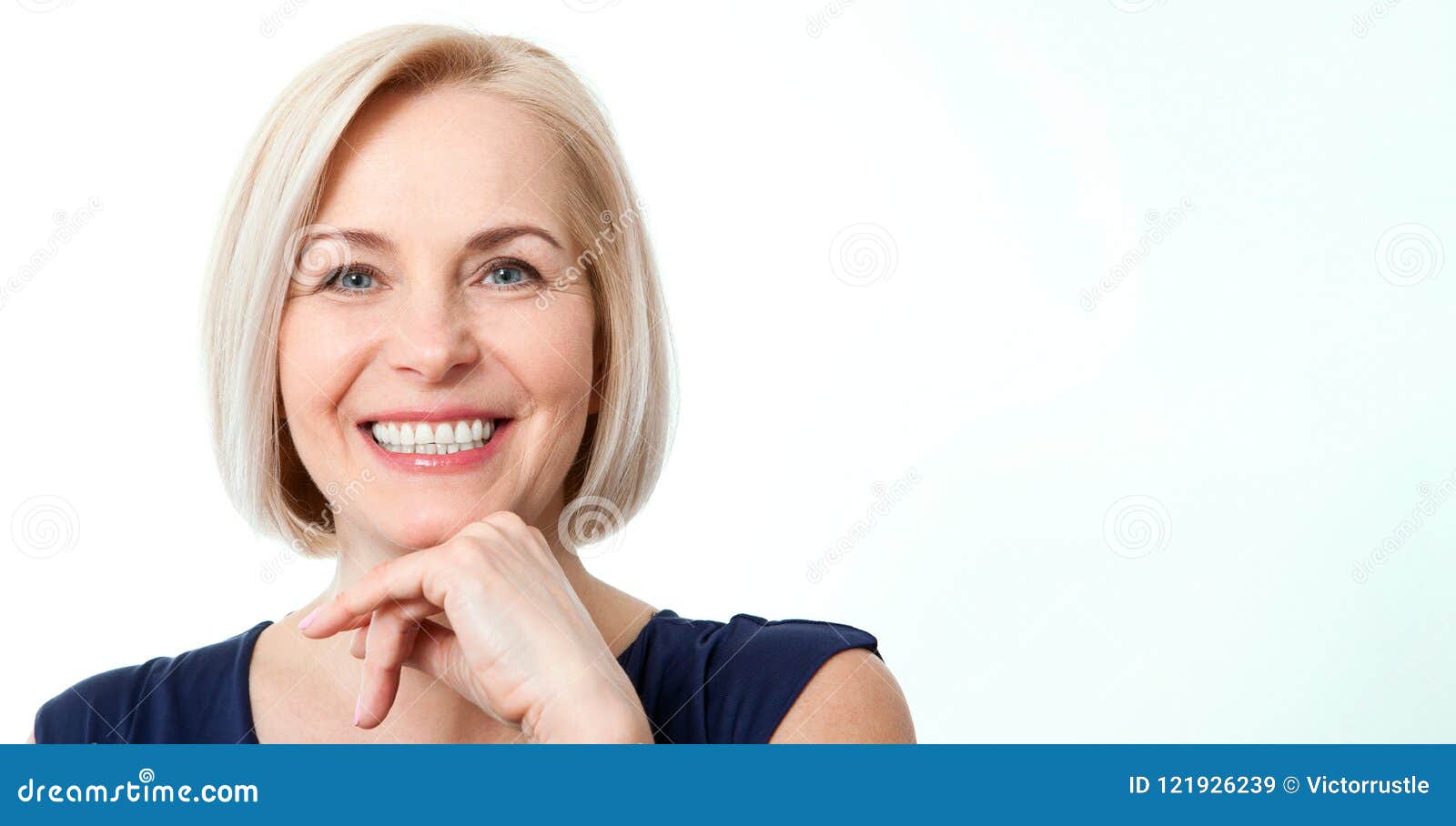 attractive middle aged woman with beautiful smile on white background