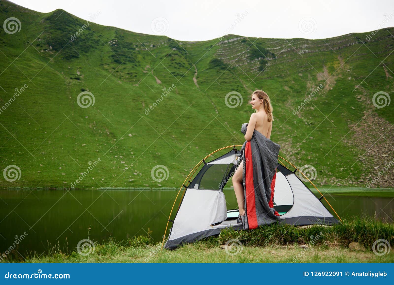 Attractive Naked Woman in Camping Stock Image