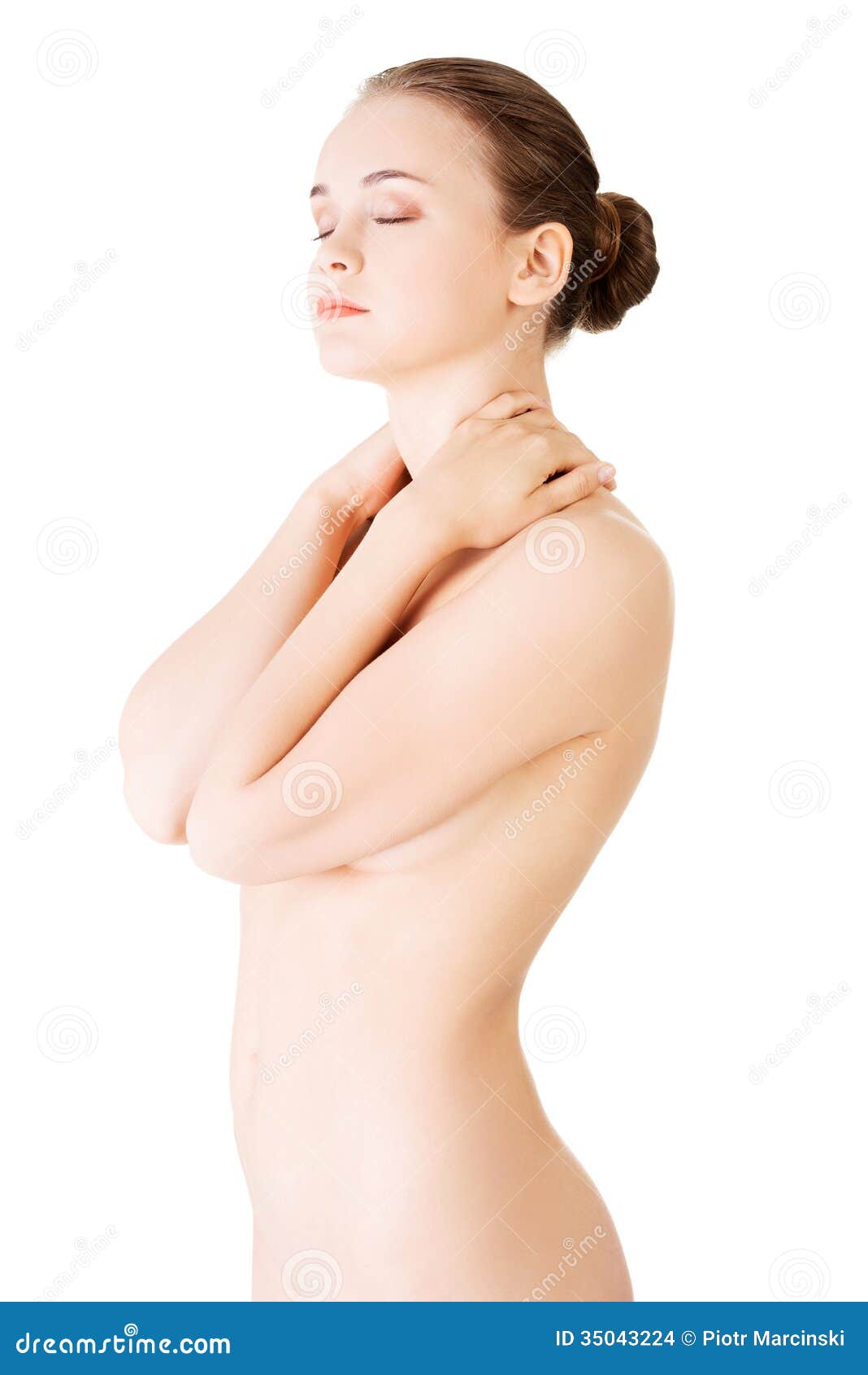 Attractive Naked Woman Touching Her Neck. Front View Stock Photo