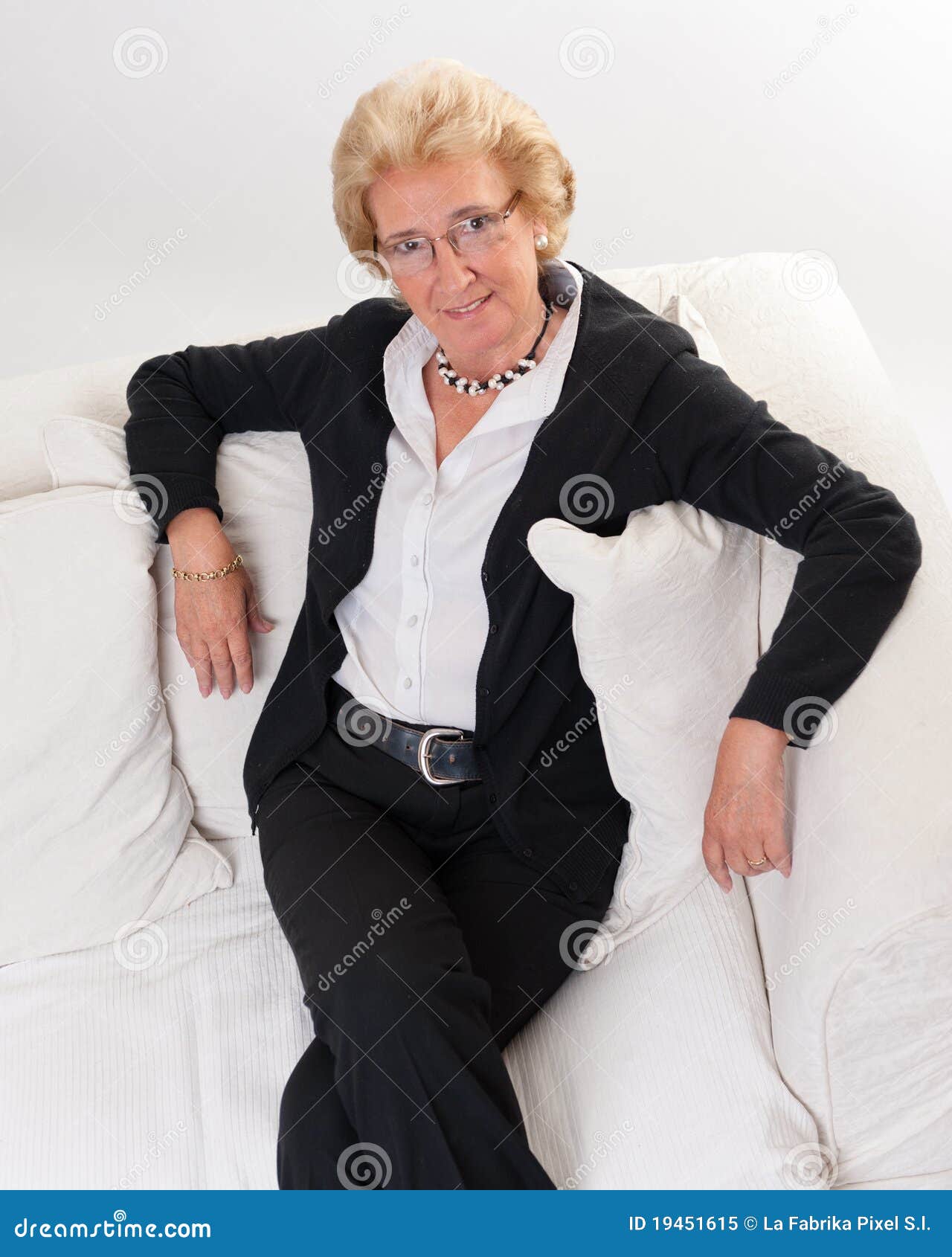 Attractive Senior Lady on a Sofa Stock Image Image of smiling