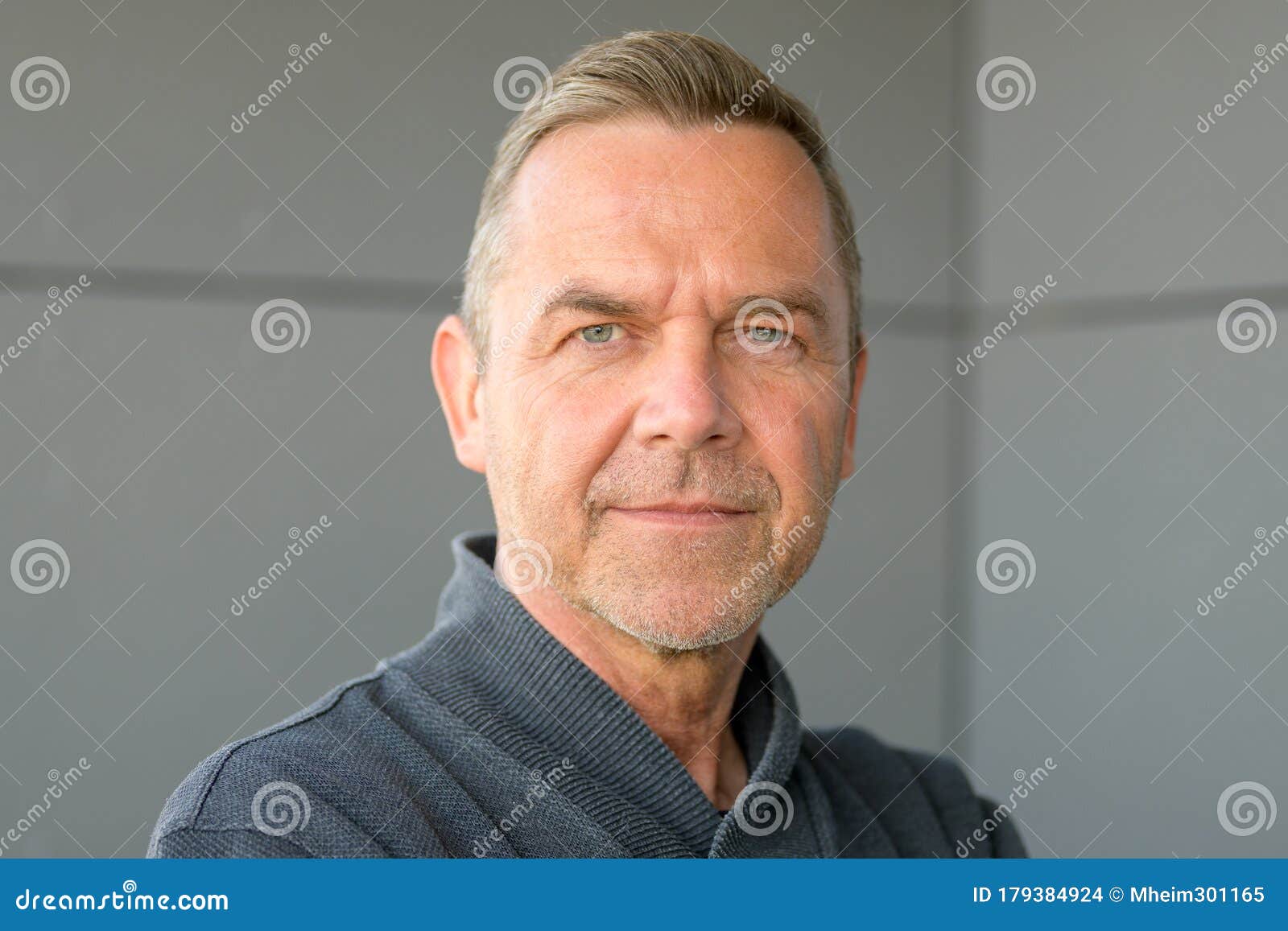 attractive serious trendy middle-aged man