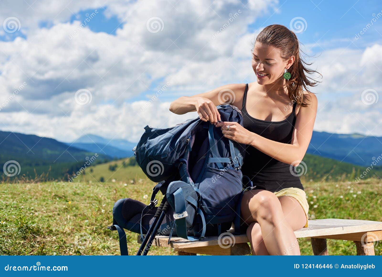 Young Smiling Woman With Backpack Hiking In Forest Stock 