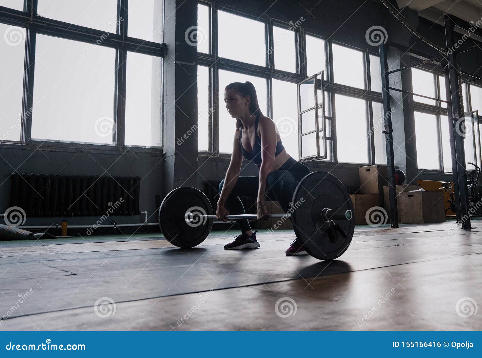 Attractive Strong Muscular Female Bodybuilder Doing Heavy Duty Squats ...