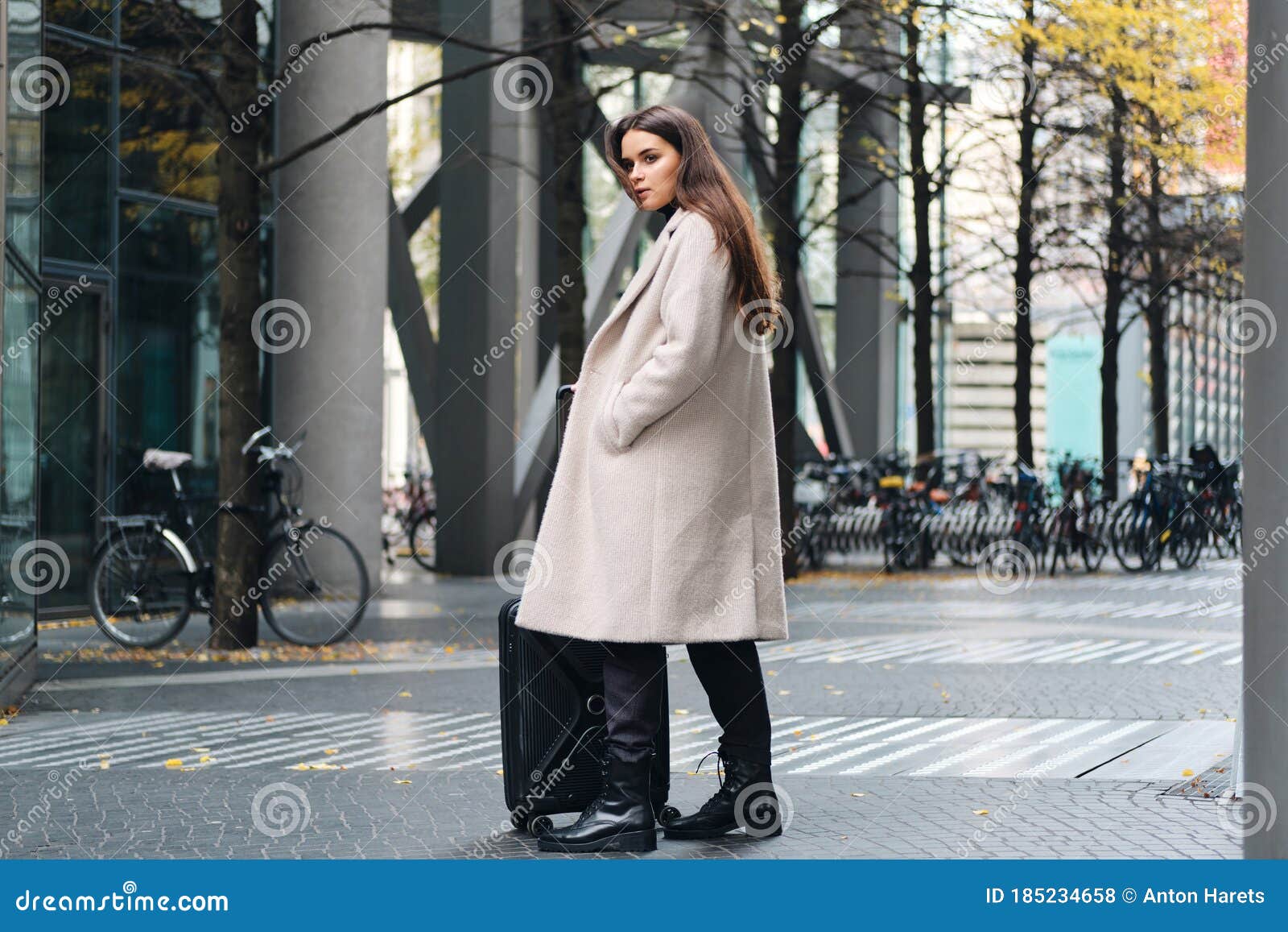 Attractive Stylish Girl in Coat Confidently Looking Aside Standing on ...