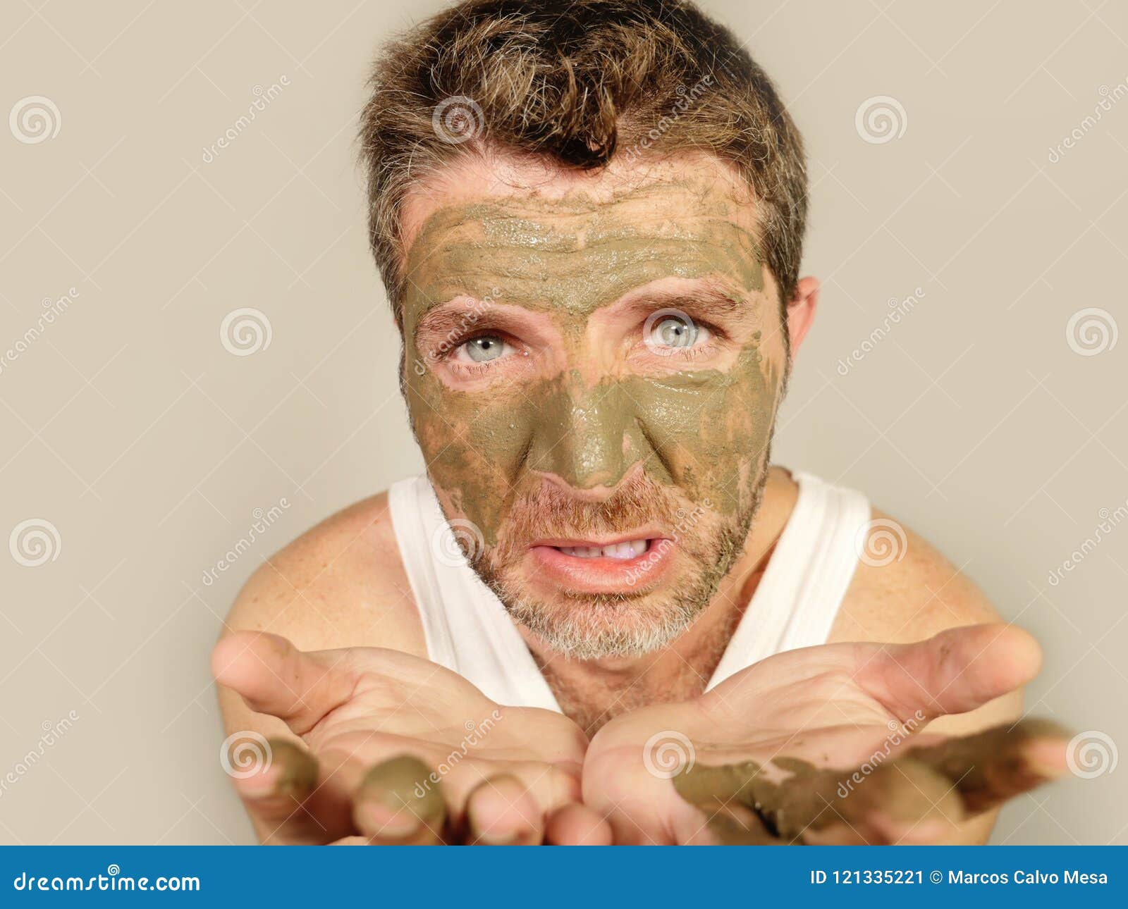 Attractive and Surprised Funny Man Horrified Looking Himself on Bathroom  Mirror Ugly and Weird Applying Green Cream on His Face I Stock Image -  Image of dirty, isolated: 121335221