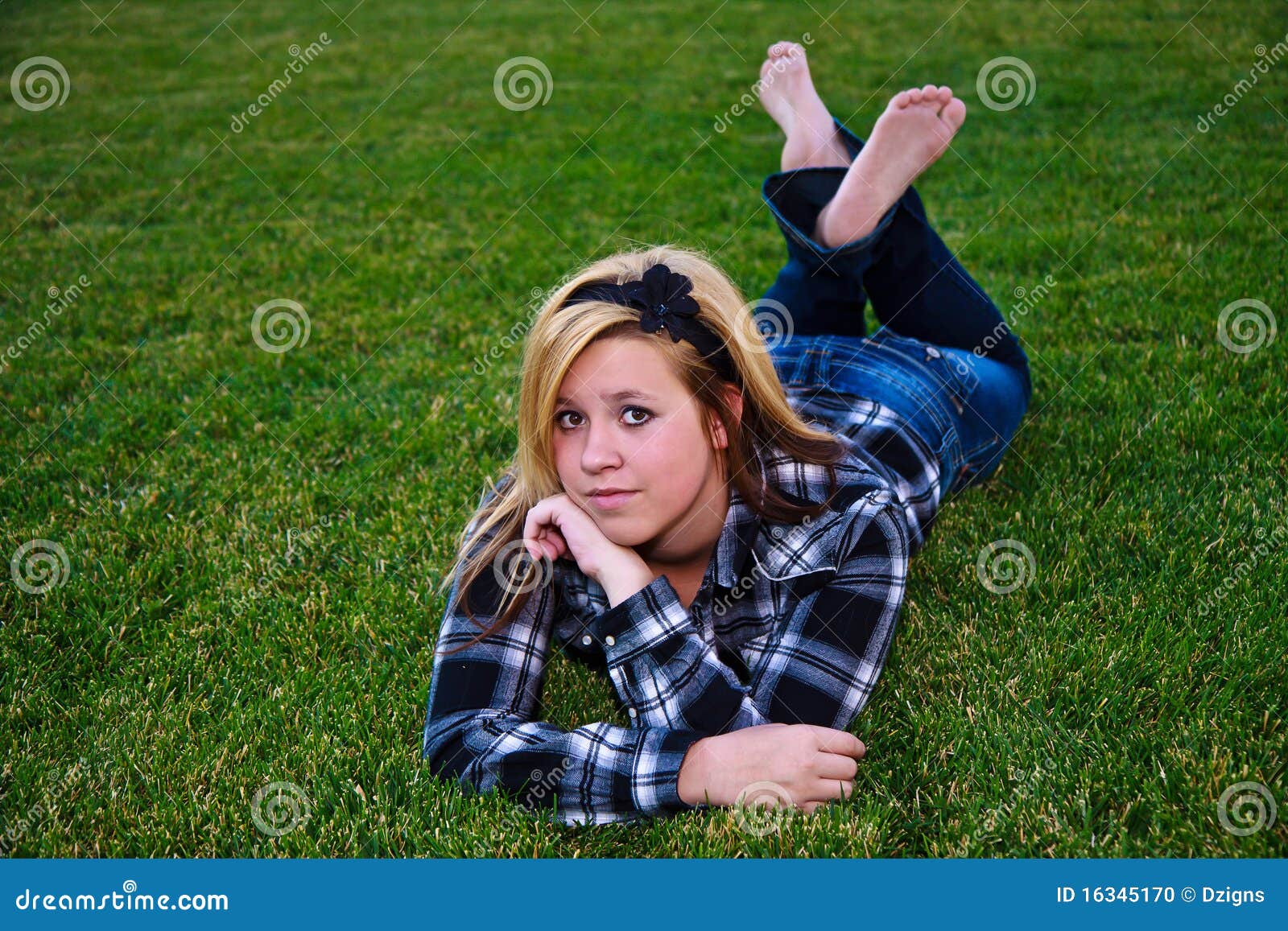 Attractive Teenage Girl Enjoying Outdoor Setting Stock