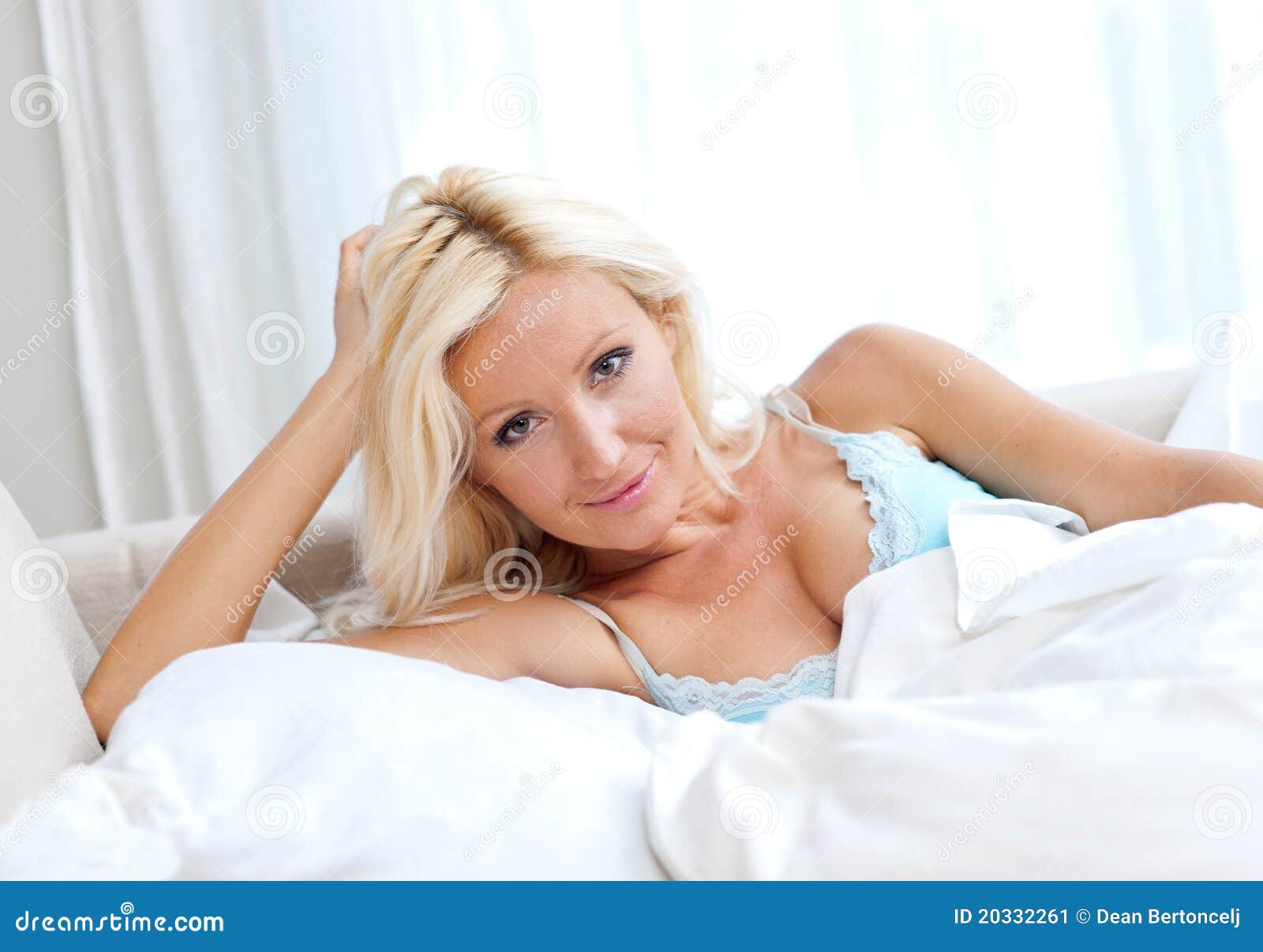 attractive woman in bed