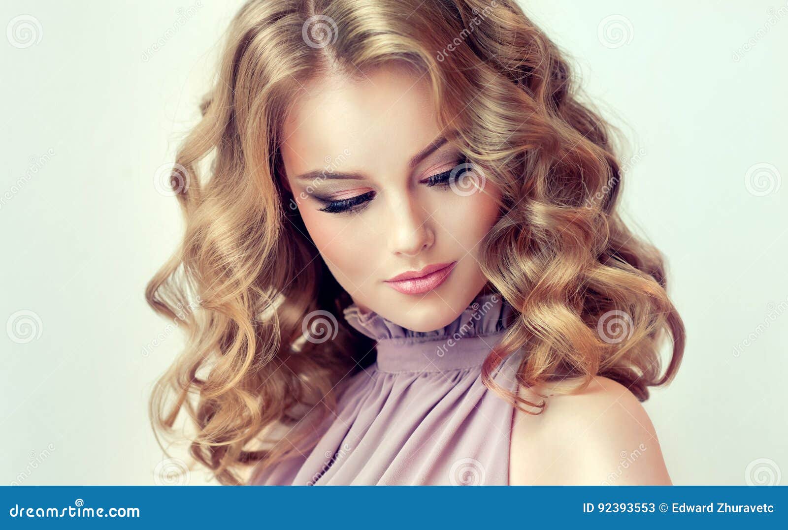 Attractive Woman Blonde With Middle Length Dense And Curly
