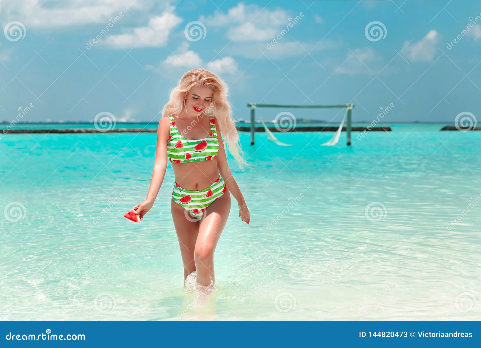 Teen Blond Girl In A Bikini Stock Photo, Picture and Royalty Free Image.  Image 21572799.
