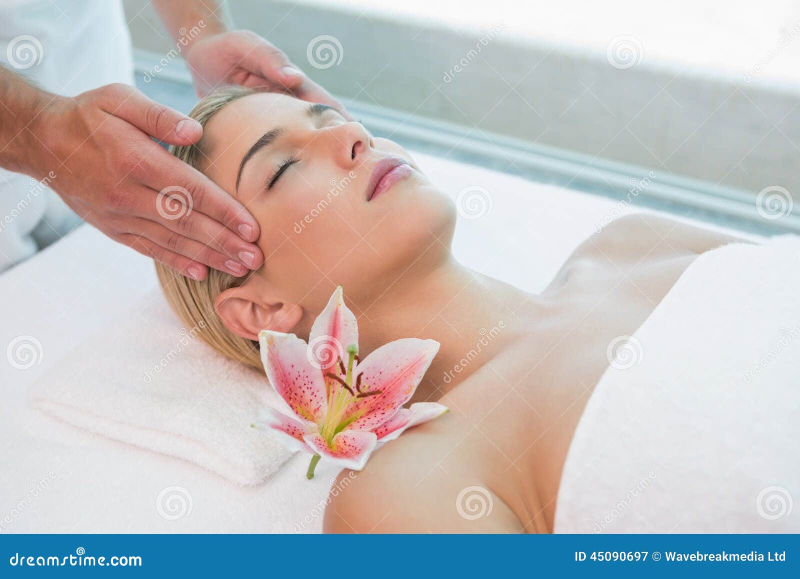 Attractive Woman Receiving Head Massage At Spa Center Stock Image
