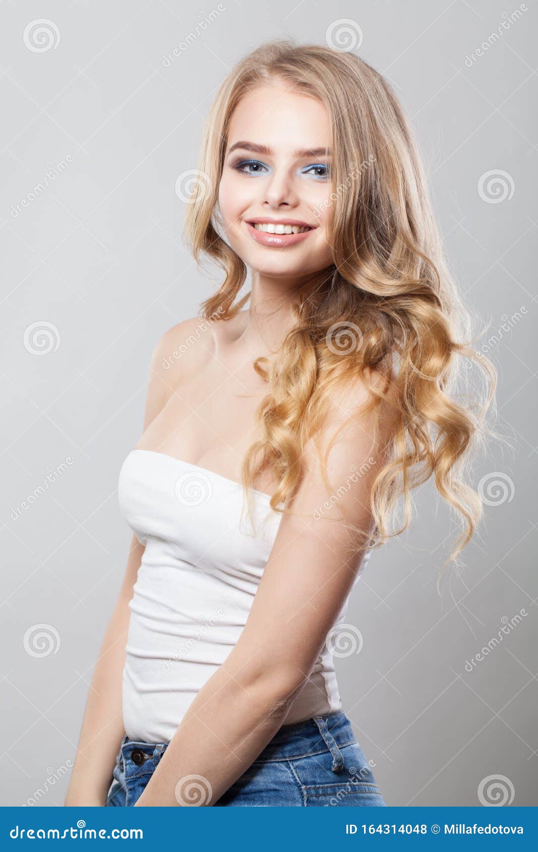 Attractive Woman Smiling. Pretty Girl with Cute Friendly Smile