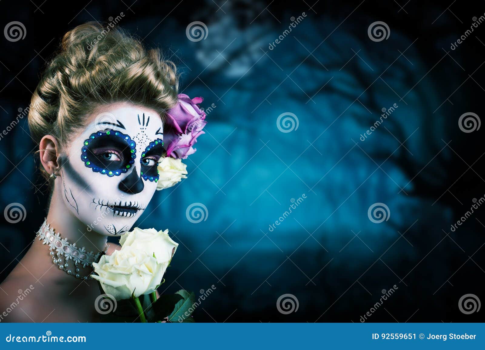 attractive woman with sugar skull make-up