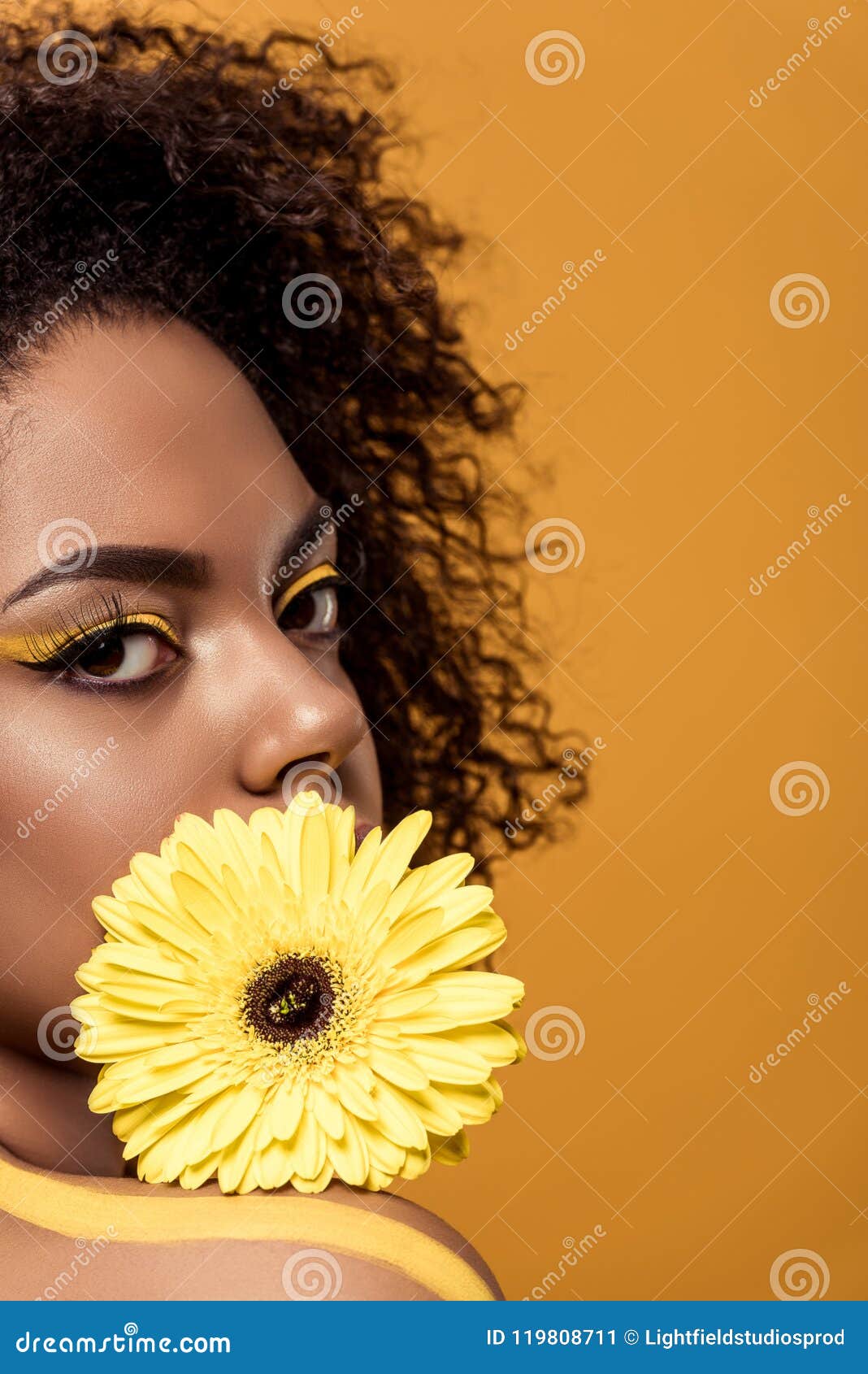 Attractive Young African American Woman with Artistic Make-up Holds Yellow  Gerbera Flower Stock Image - Image of bonny, orange: 119808711