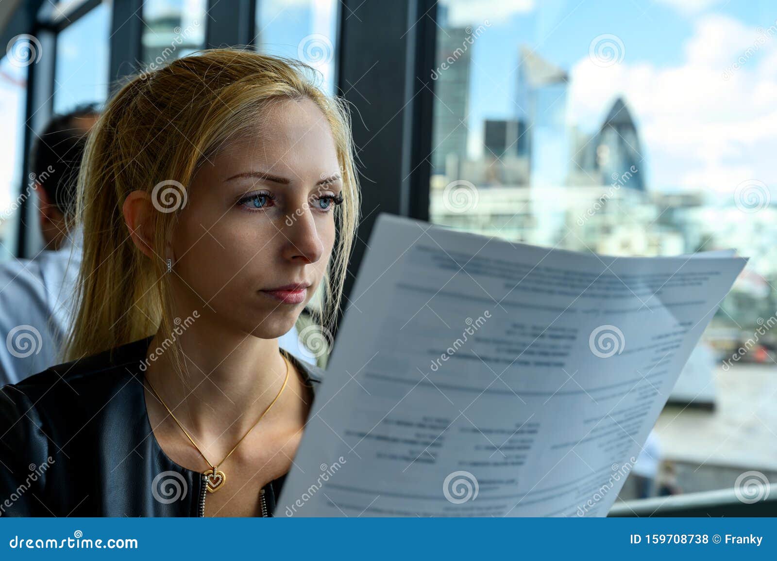 Attractive Young Woman Having Lunch in a Restaurant in Downtown London