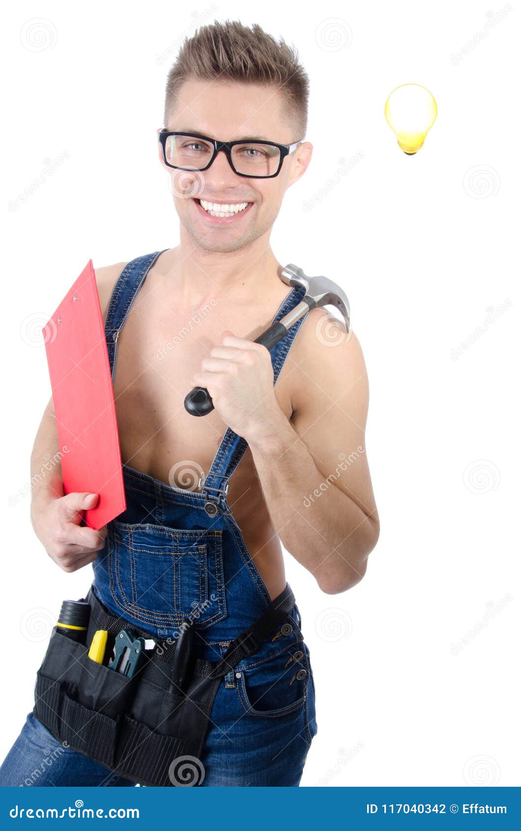 Young Handsome Handyman Holding a Hammer. Stock Photo Image of