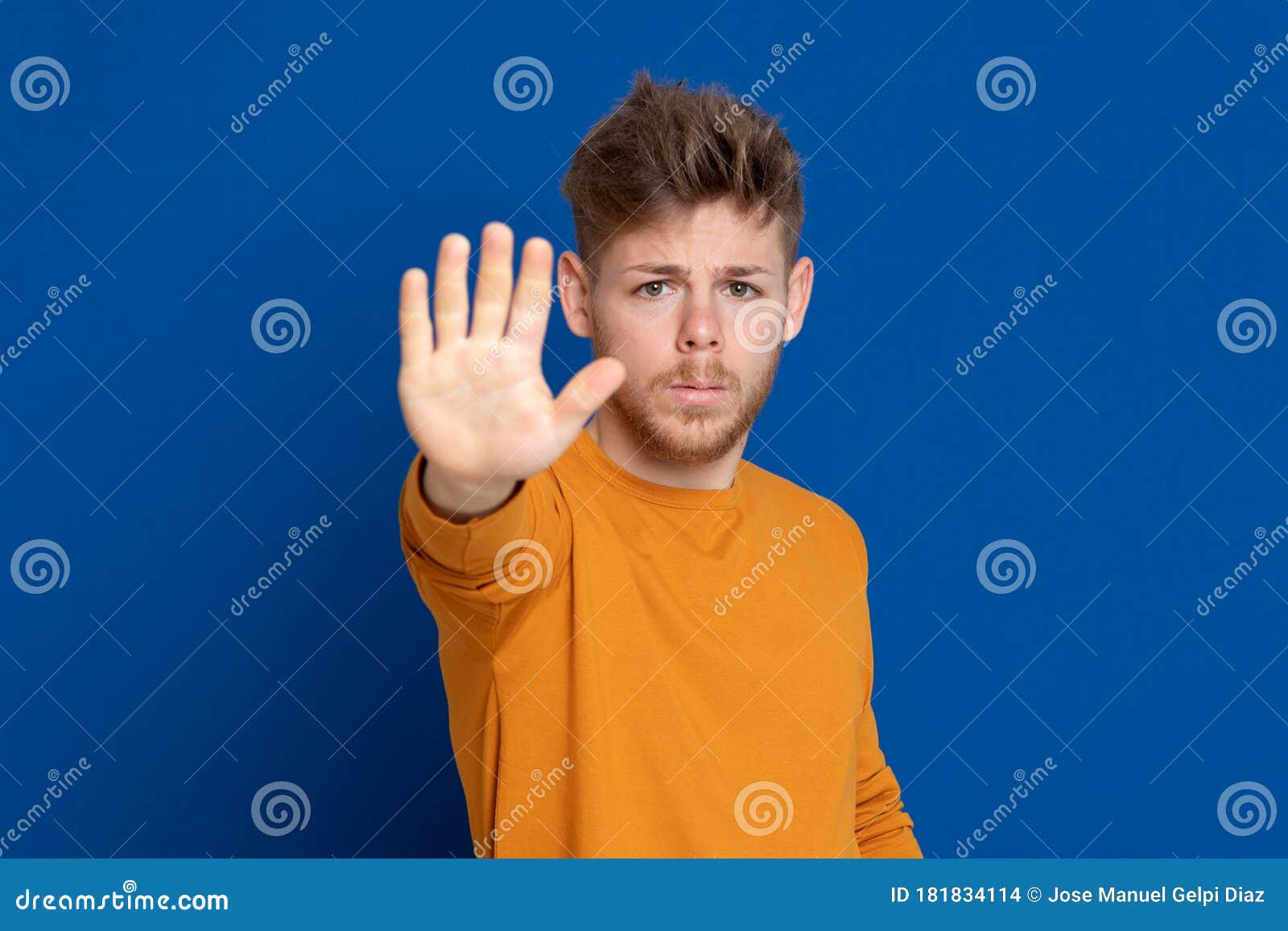 attractive young guy with a yellow t-shirt