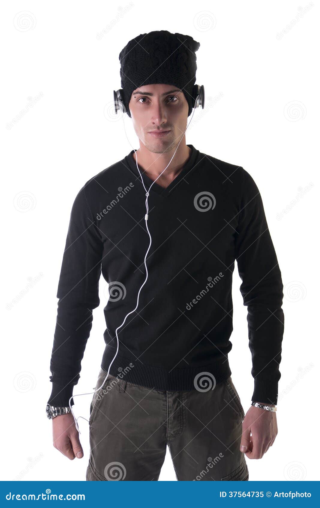 Attractive Young Man with Black Wool Hat and Headphones Stock Image
