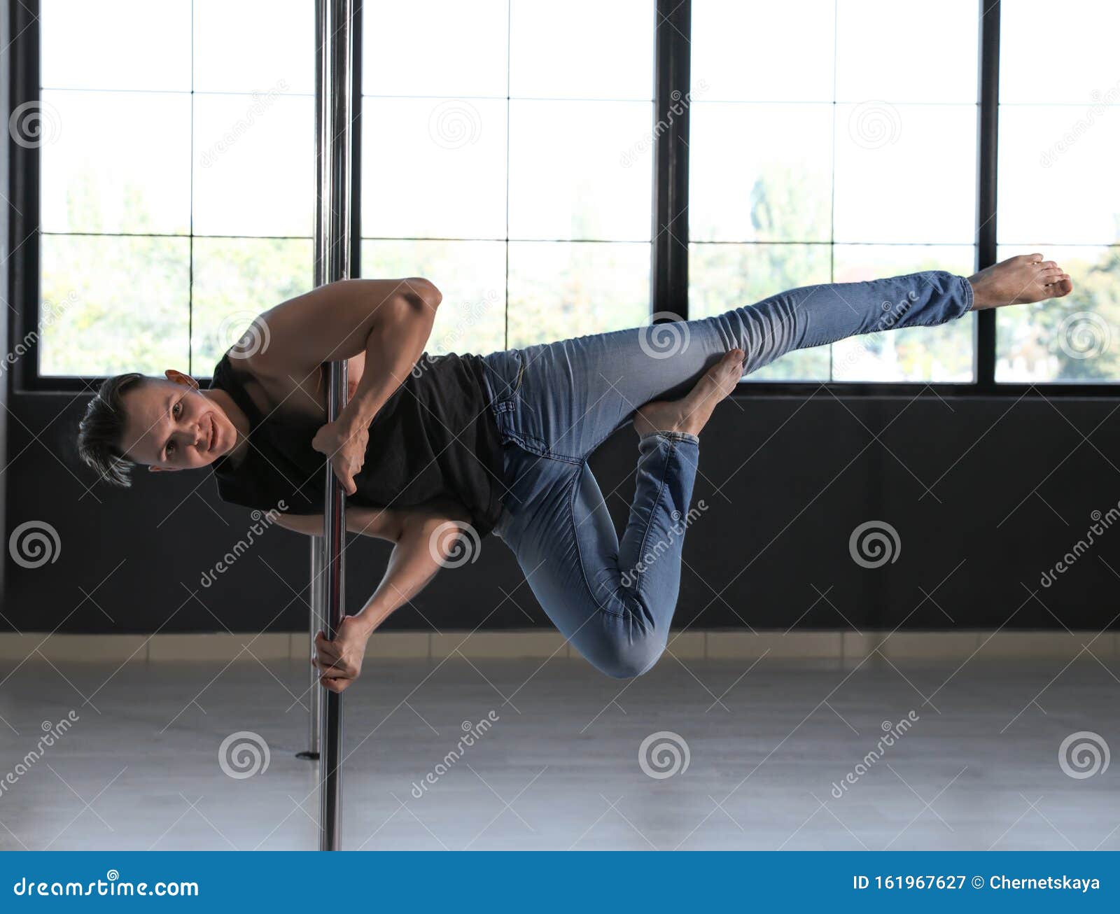 Attractive Man Dancing in Studio with Poles Stock Image Image of