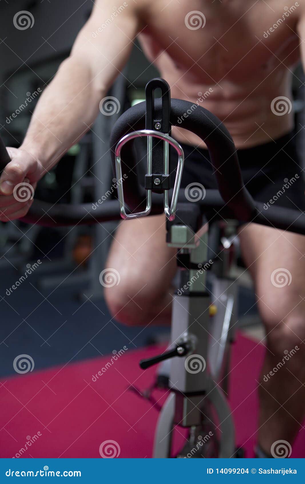 Attractive Young Man in Gym on Bike Stock Photo Image of power