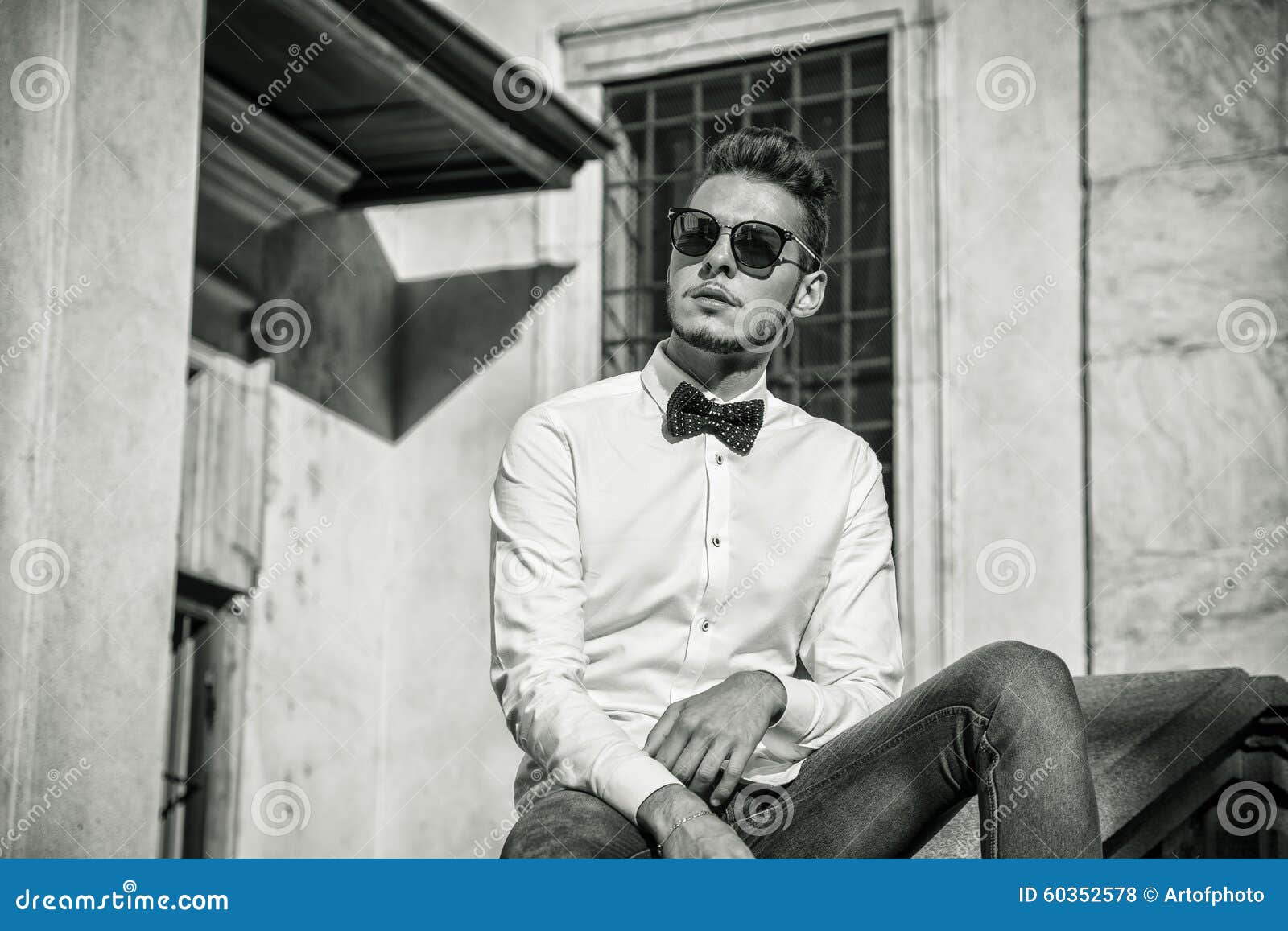 Attractive Young Man Sitting in City Wearing Stock Photo - Image of ...