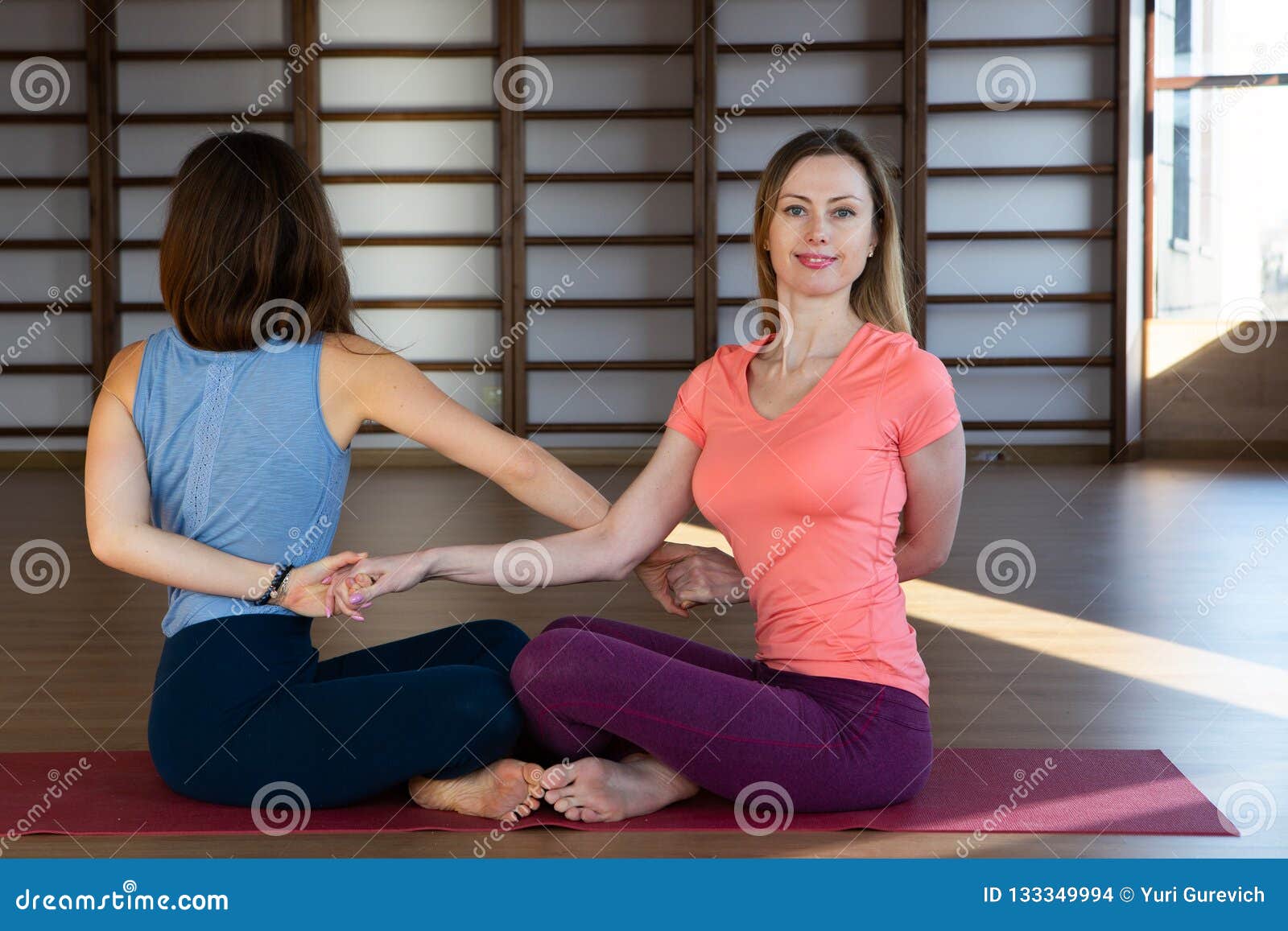 Attractive Young Sport Girls Are Doing Yoga Together Group Training