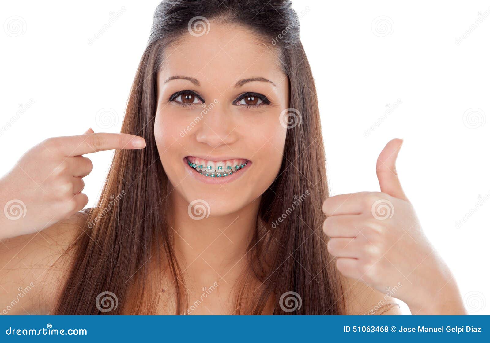 attractive young woman with brackets saying ok