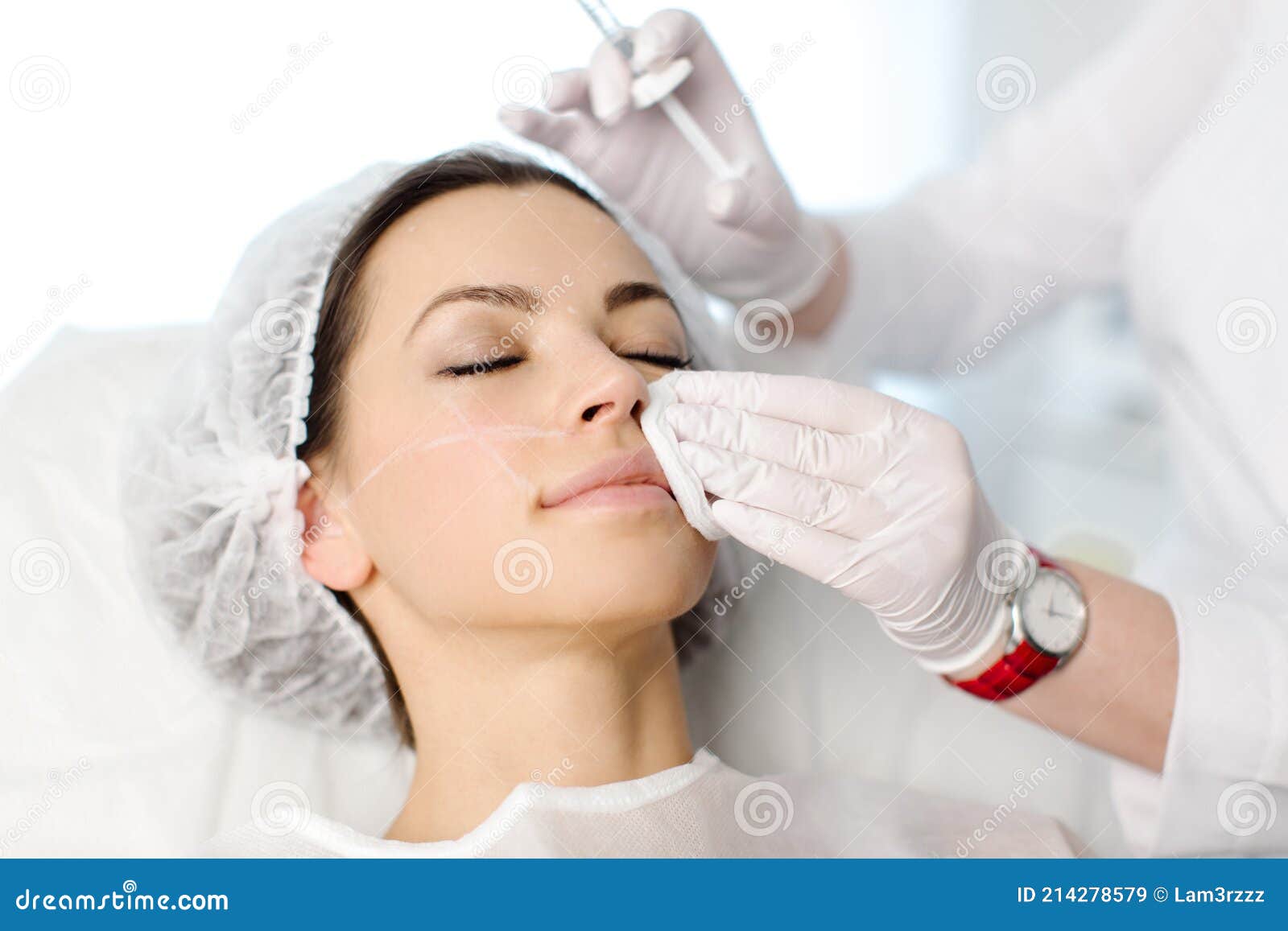 Attractive Young Woman Is Getting A Rejuvenating Facial Injections She Is Sitting Calmly At