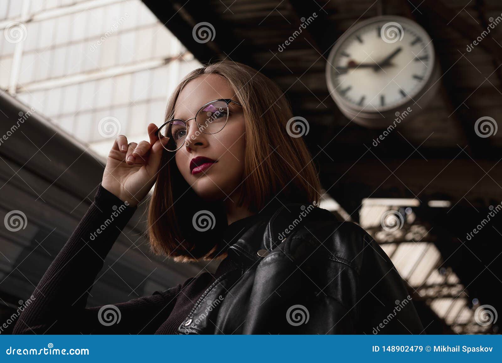 Attractive Young Woman Millenial in Black Clothes and a Hat and Glasses ...