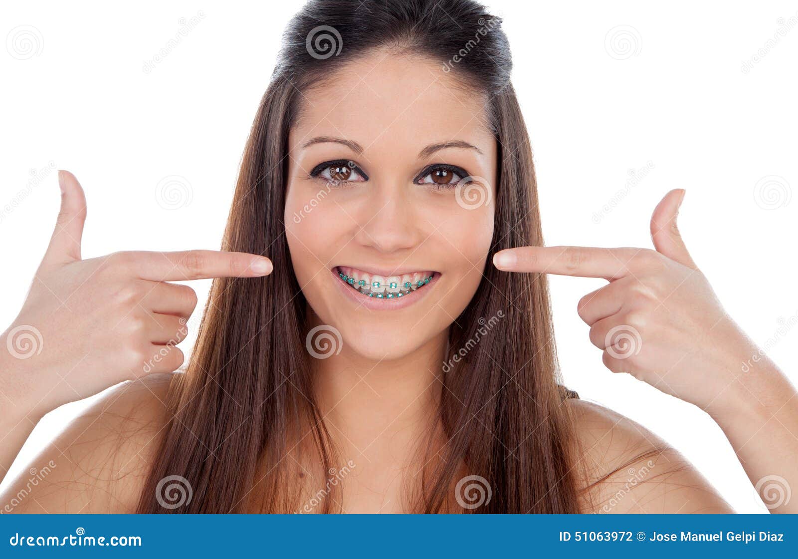 attractive young woman pointing her brackets
