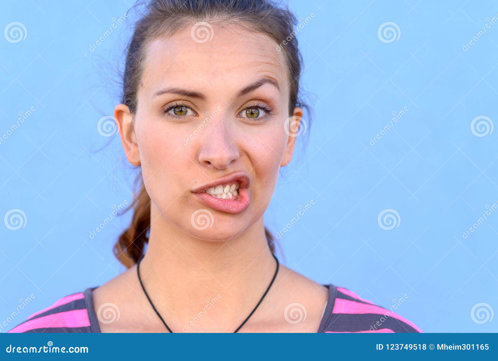 Attractive Young Woman Pulling a Funny Face Stock Photo - Image of  expression, portrait: 123749518