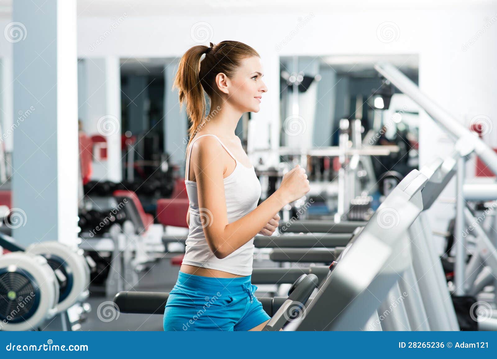 Attractive Young Woman Runs on a Treadmill Stock Photo Image of