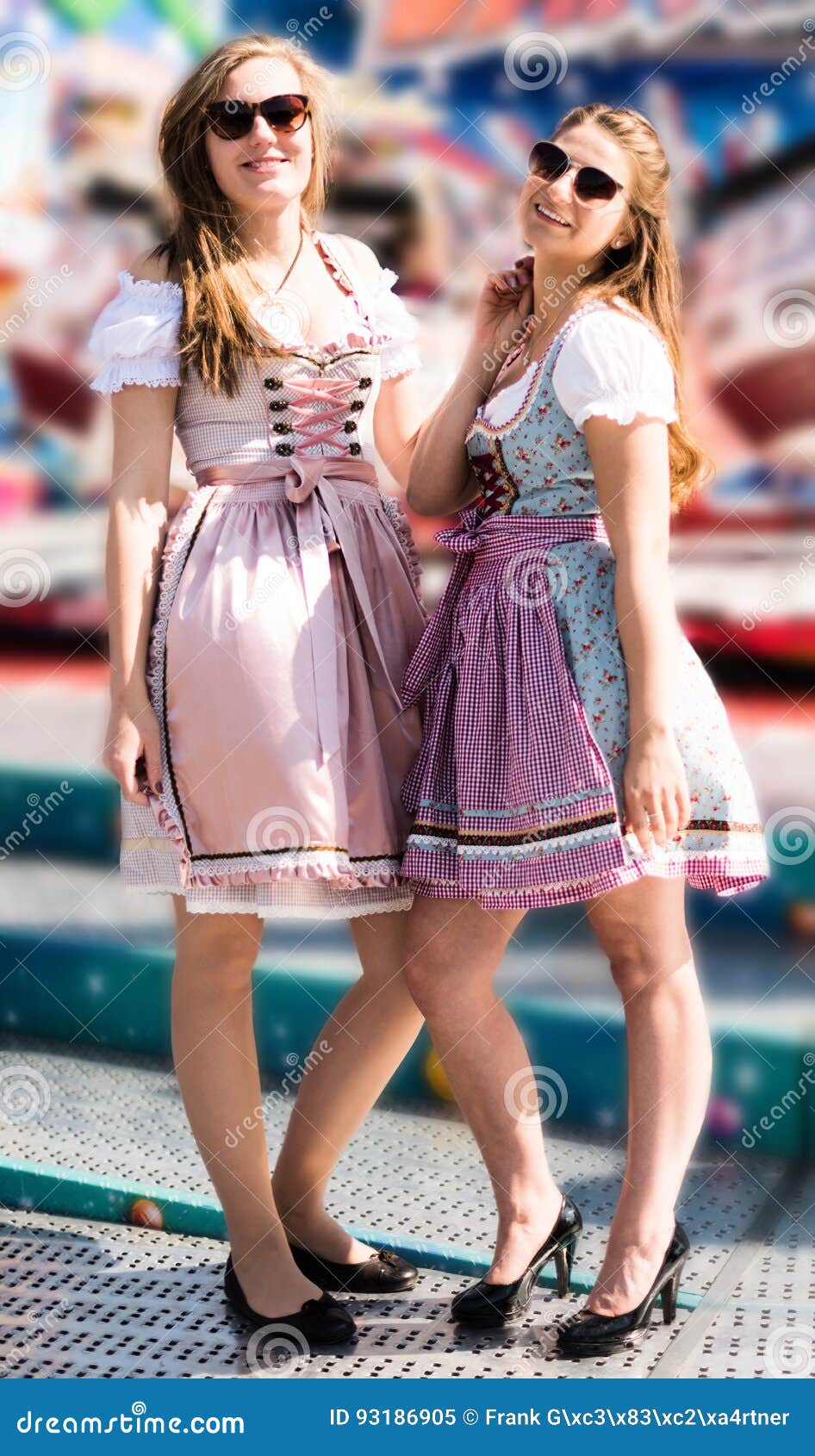 Attractive Young Women at German Funfair Oktoberfest with Traditional ...