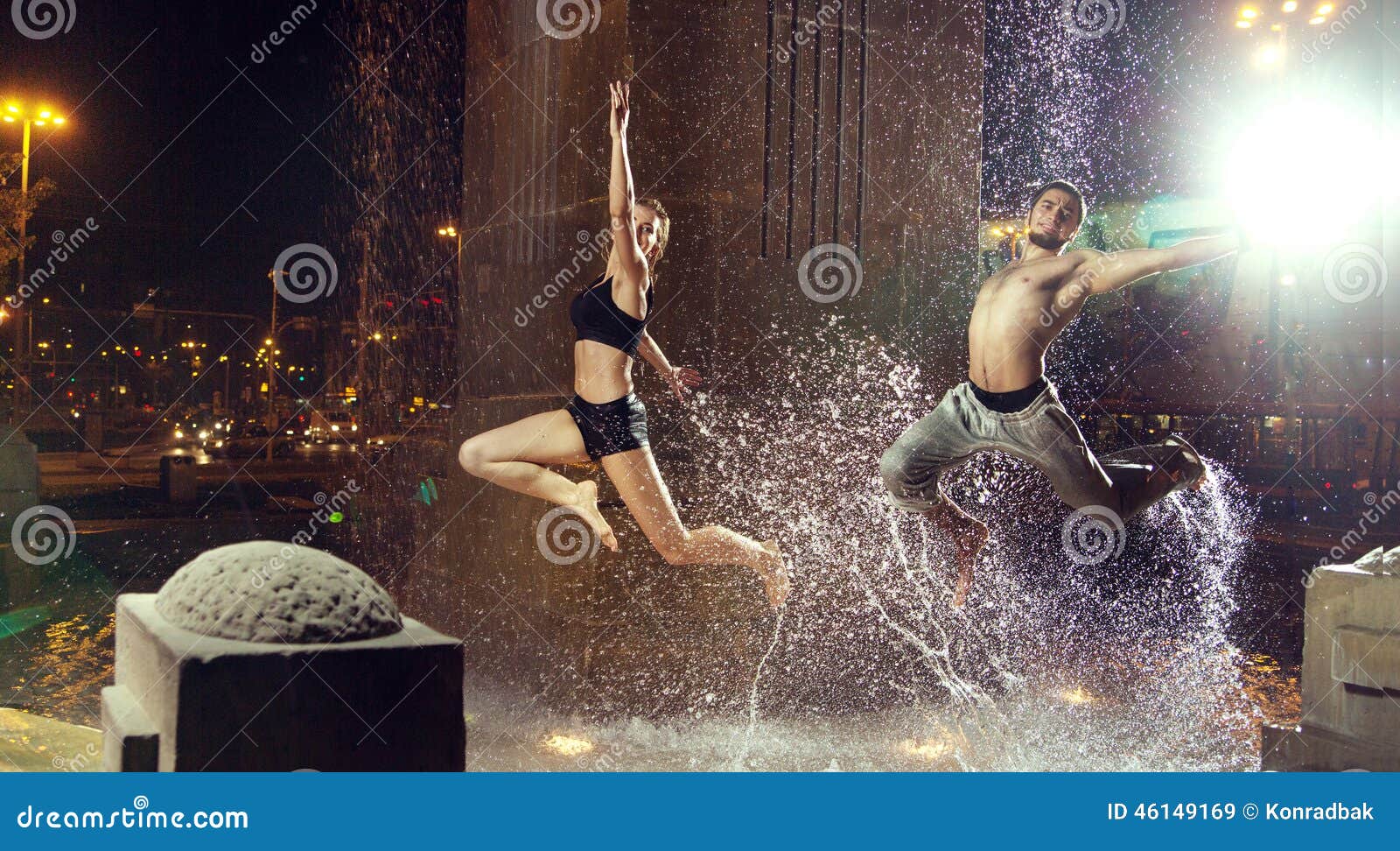 Attractiveain Athletes Jumping in the Fountain Stock Image Image of